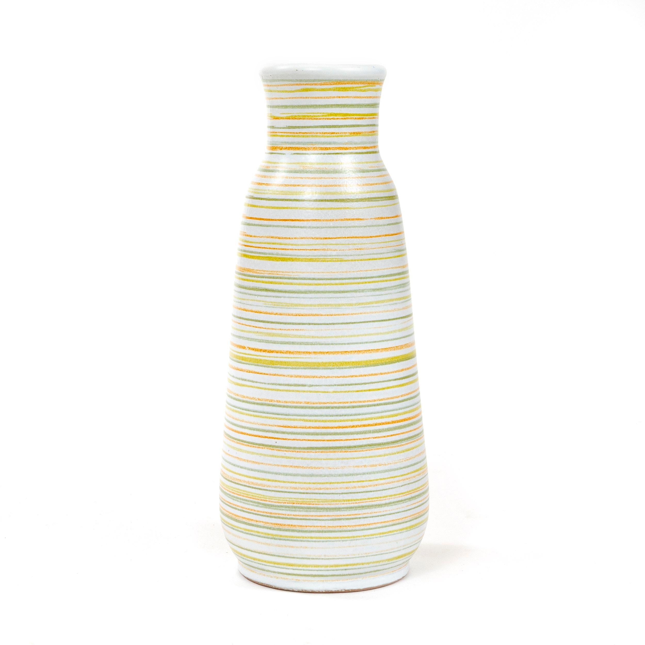 An uncommon small ceramic vase with multicolored stripes. Signed on the underside as depicted.