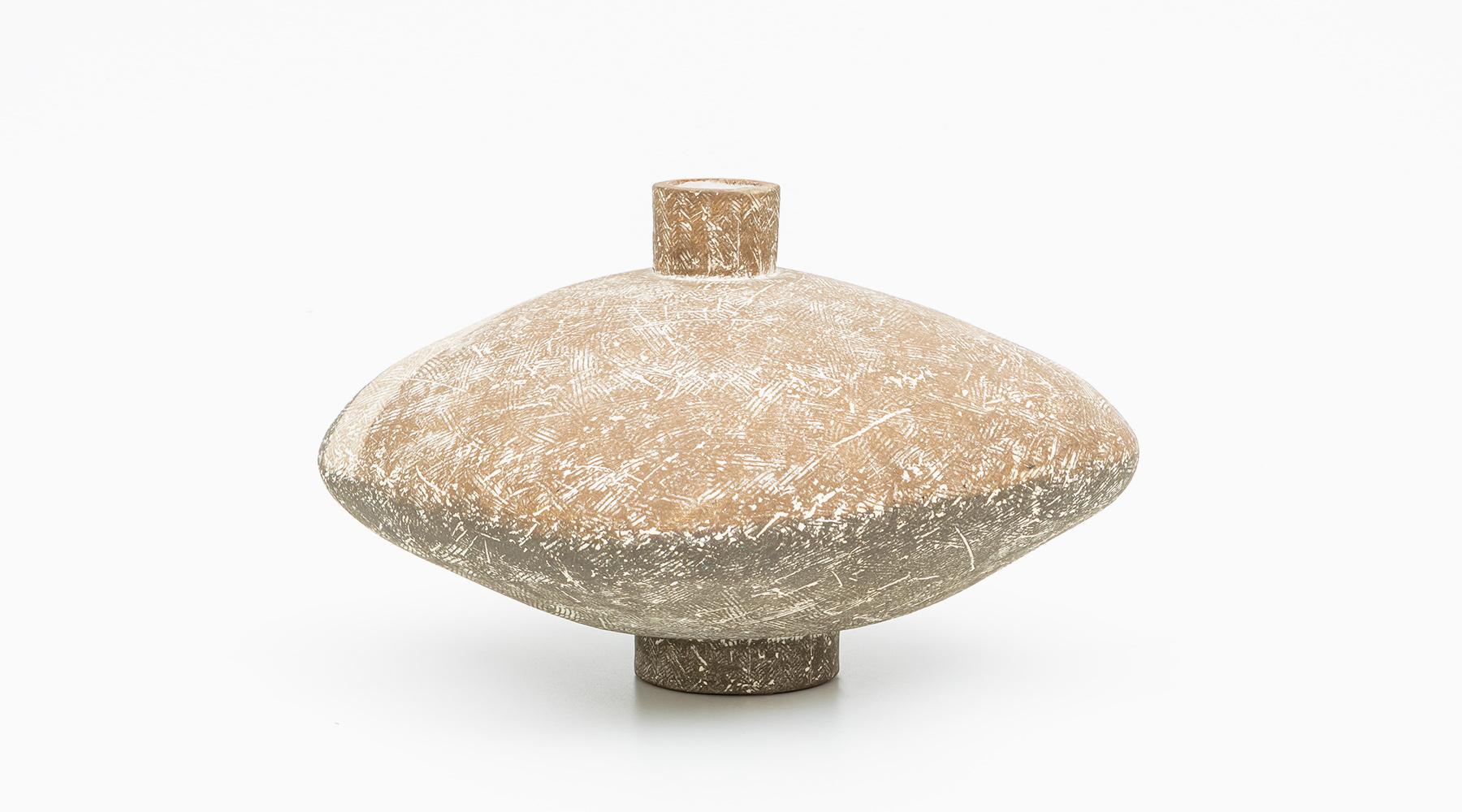 Glazed stoneware with engobe decoration, Vase, ceramic by Claude Conover, USA, 1960.

The stoneware of Claude Conover has its roots in Primitive sculpture and recalls the appearance of ancient vessels. Each piece of Claude Conover´s stoneware is