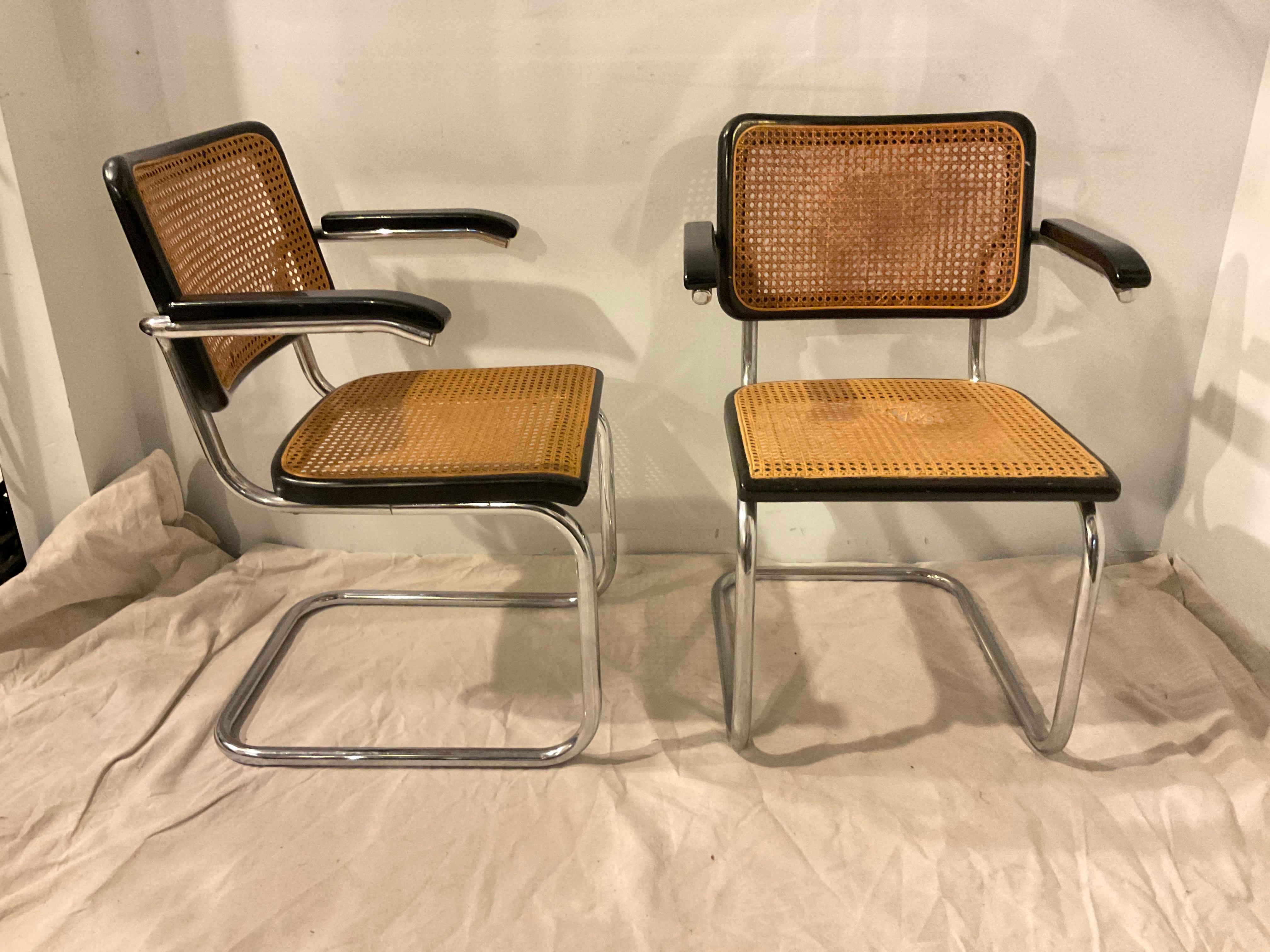 Pair of 1960s Cesca chairs by Marcel Breuer for Thonet.
One area of caning is fine, the 3 other sections need to be re caned.