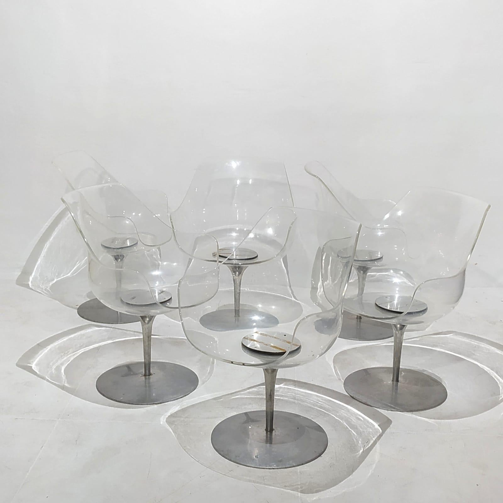Very Rare and complete Set of four (4) Champagner chairs designed by Erwine & Estelle Laverne, France circa 1960s

Great design with it’s transparent lucite seat shell and Aluminum base, the Champagner chair is both highly conformable and uniquely