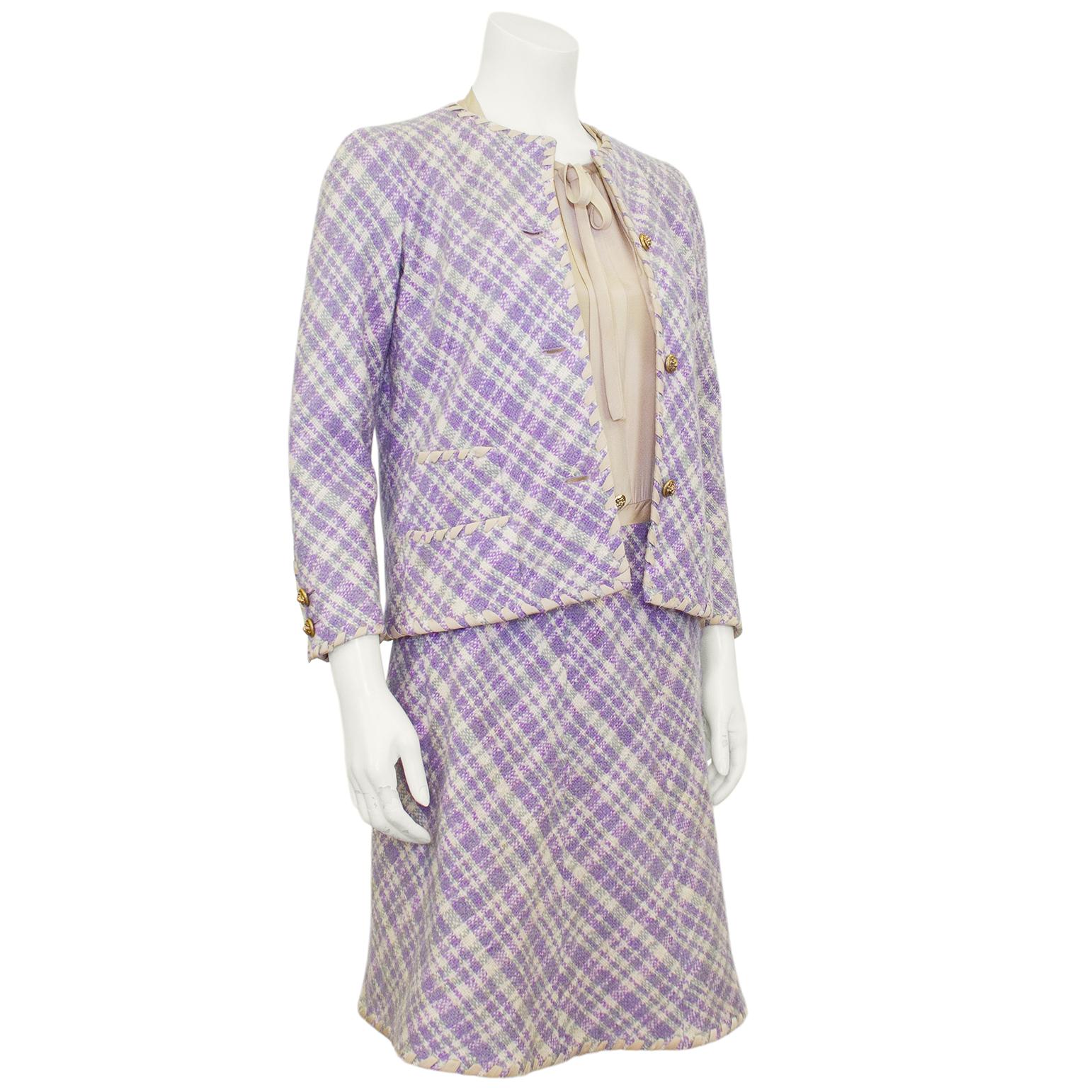 Extremely beautiful lightweight wool tweed 1960s Chanel Haute Couture dress and jacket ensemble in the most gorgeous palette of lilac, sage green and beige. The jacket is collarless with double slit pockets on both hips and stunning gold tone metal
