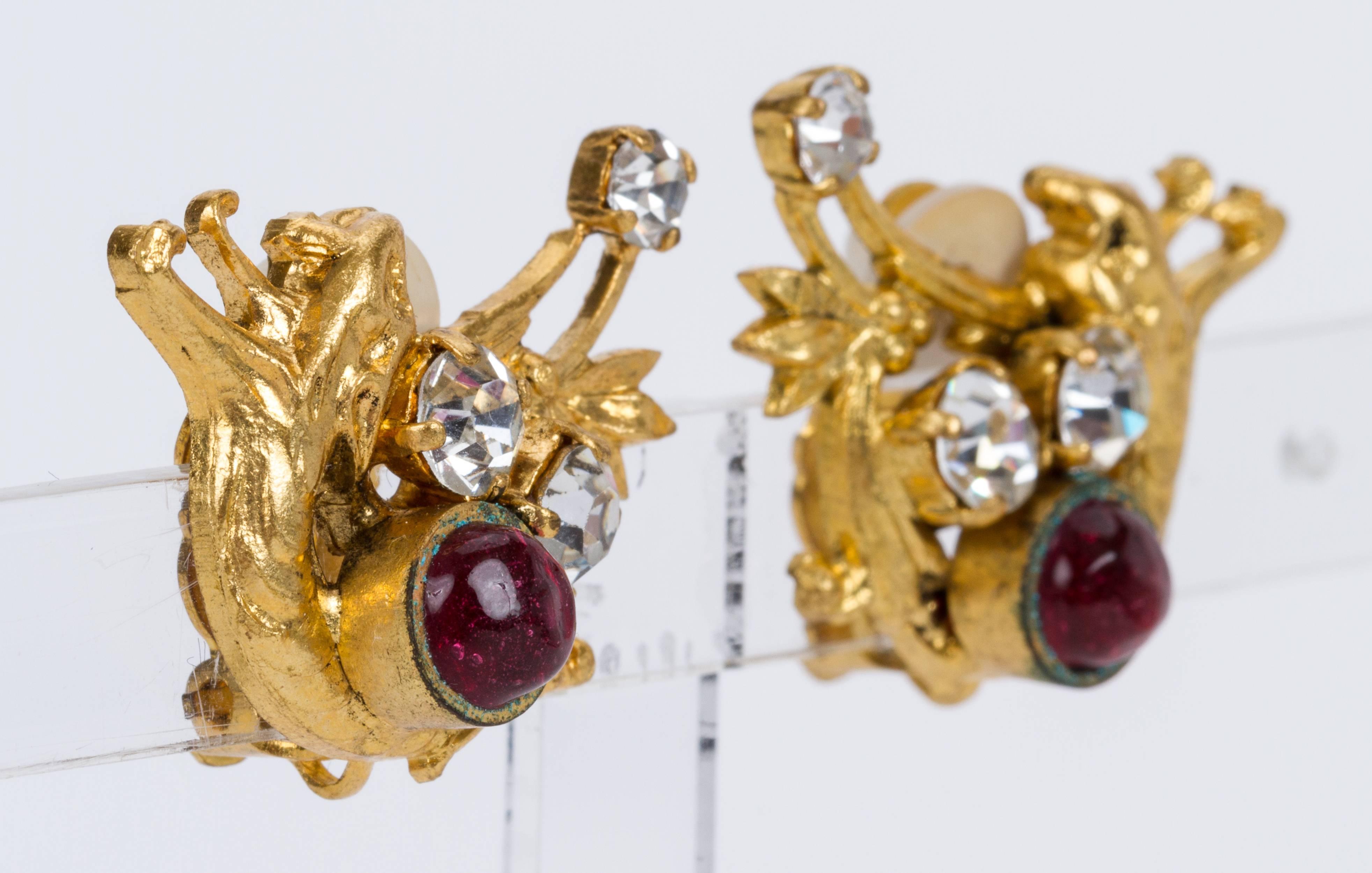 Chanel 60s rare wolf clip earrings with red gripoix and crystal cabochons. Come with original box.