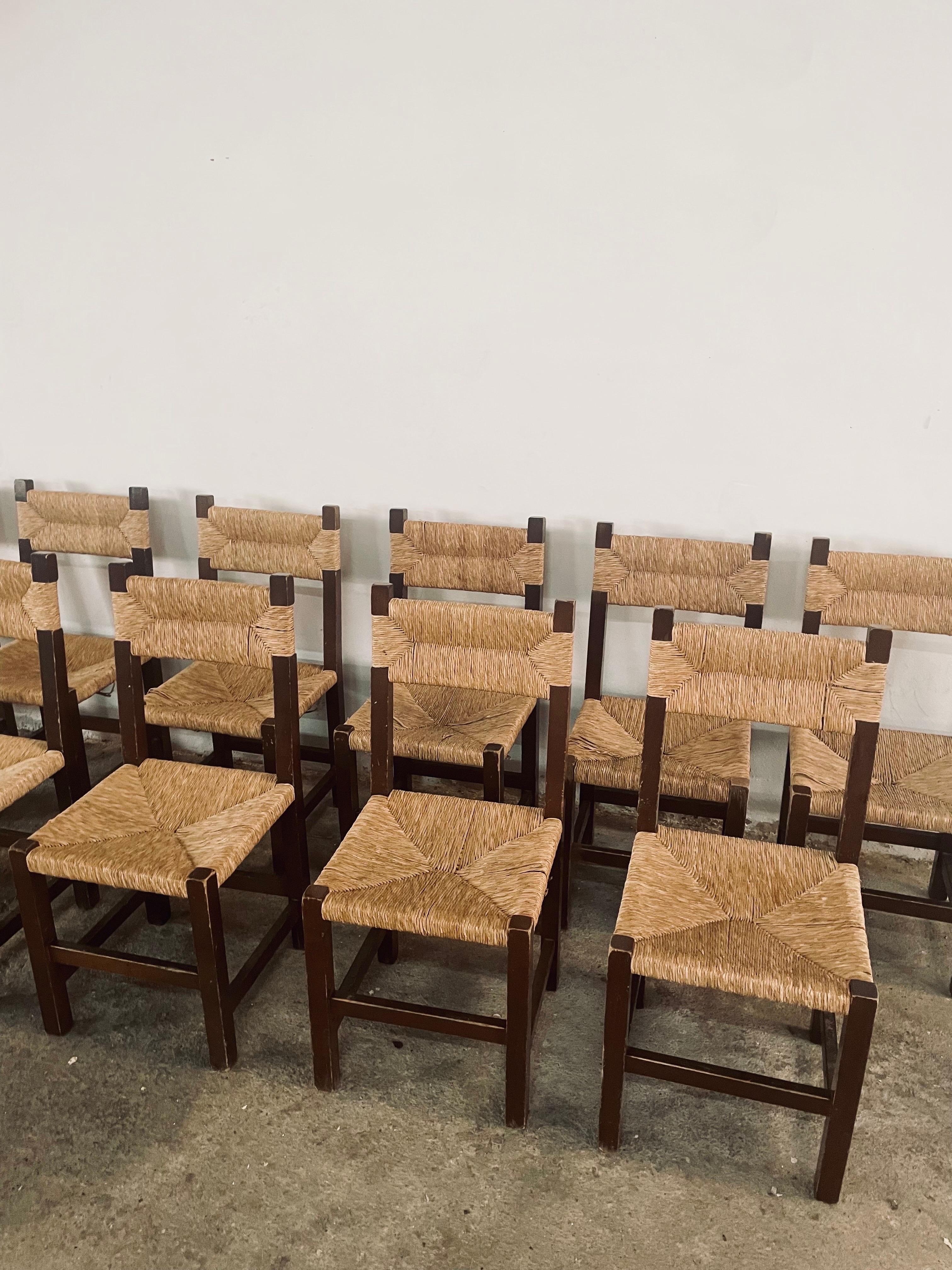 Set of eight (8) Vintage mid-century French Charles Dudouyt style country wicker or rush Seat Chairs, mostly original condition, Rush seats have been completely replaced by natural Anea using only artisanal techniques, This vintage set remains fully
