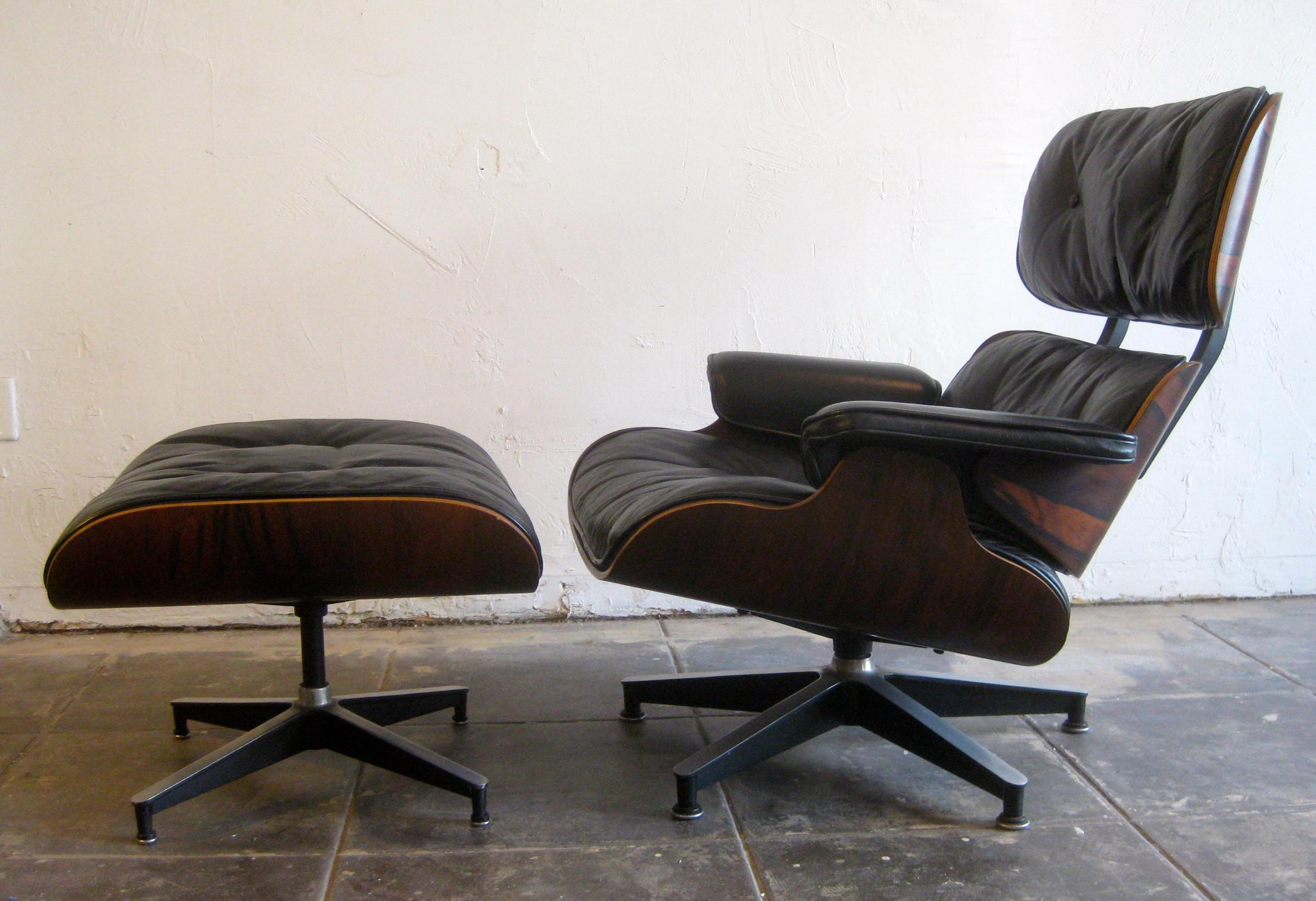 Stunning original 2nd generation Herman Miller 670 rosewood lounge chair and matching 671 ottoman designed by Charles Eames. This chair dates from the early 1960s and is 100% original. Features black leather down cushions. The rosewood shells are