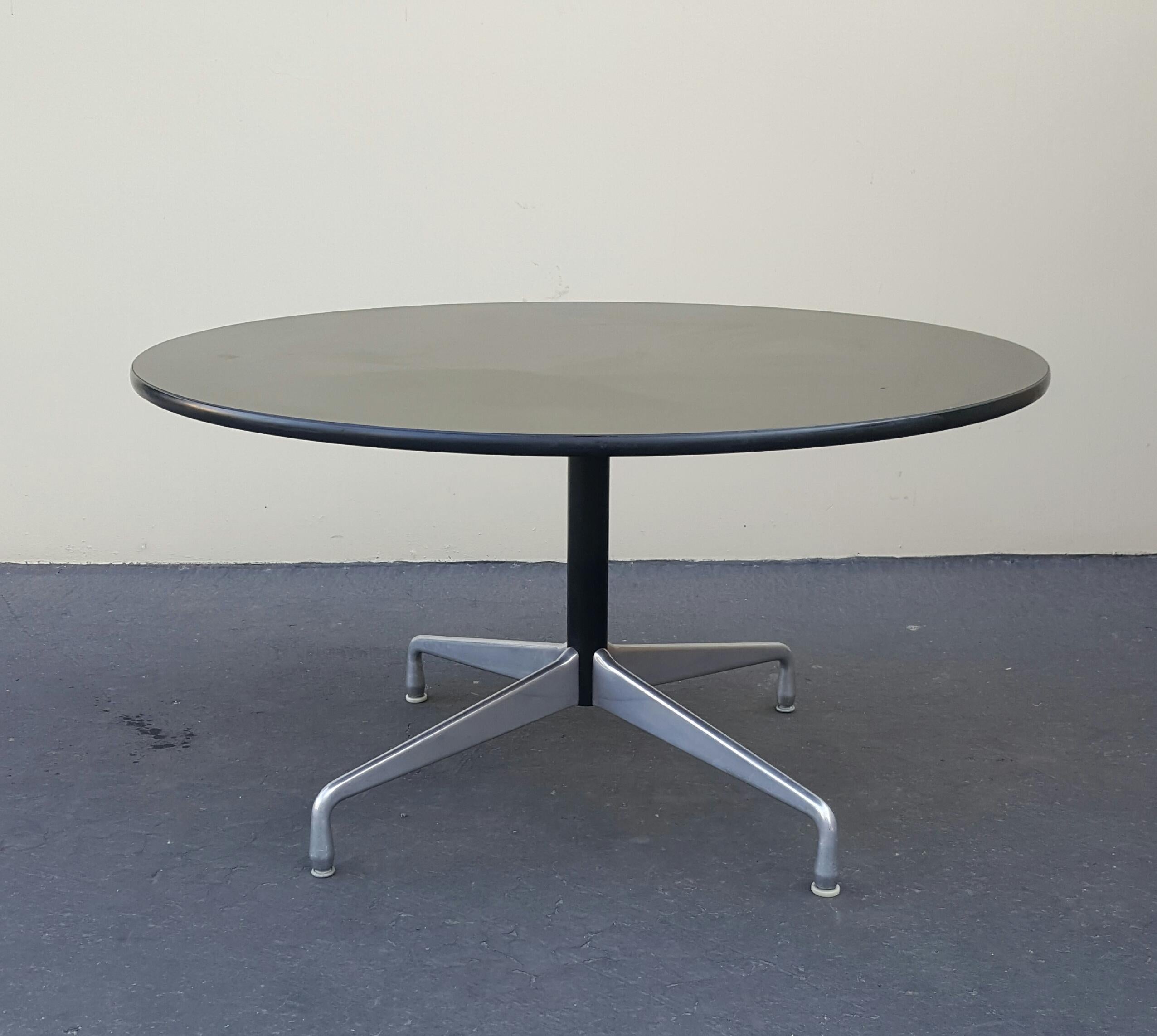 1960s Charles Eames aluminum group conference or dining table with segmented solid aluminum four star base.
this sleek and elegant design by Charles and Ray Eames complements any home or office setting.
Classic Herman Miller dining or conference