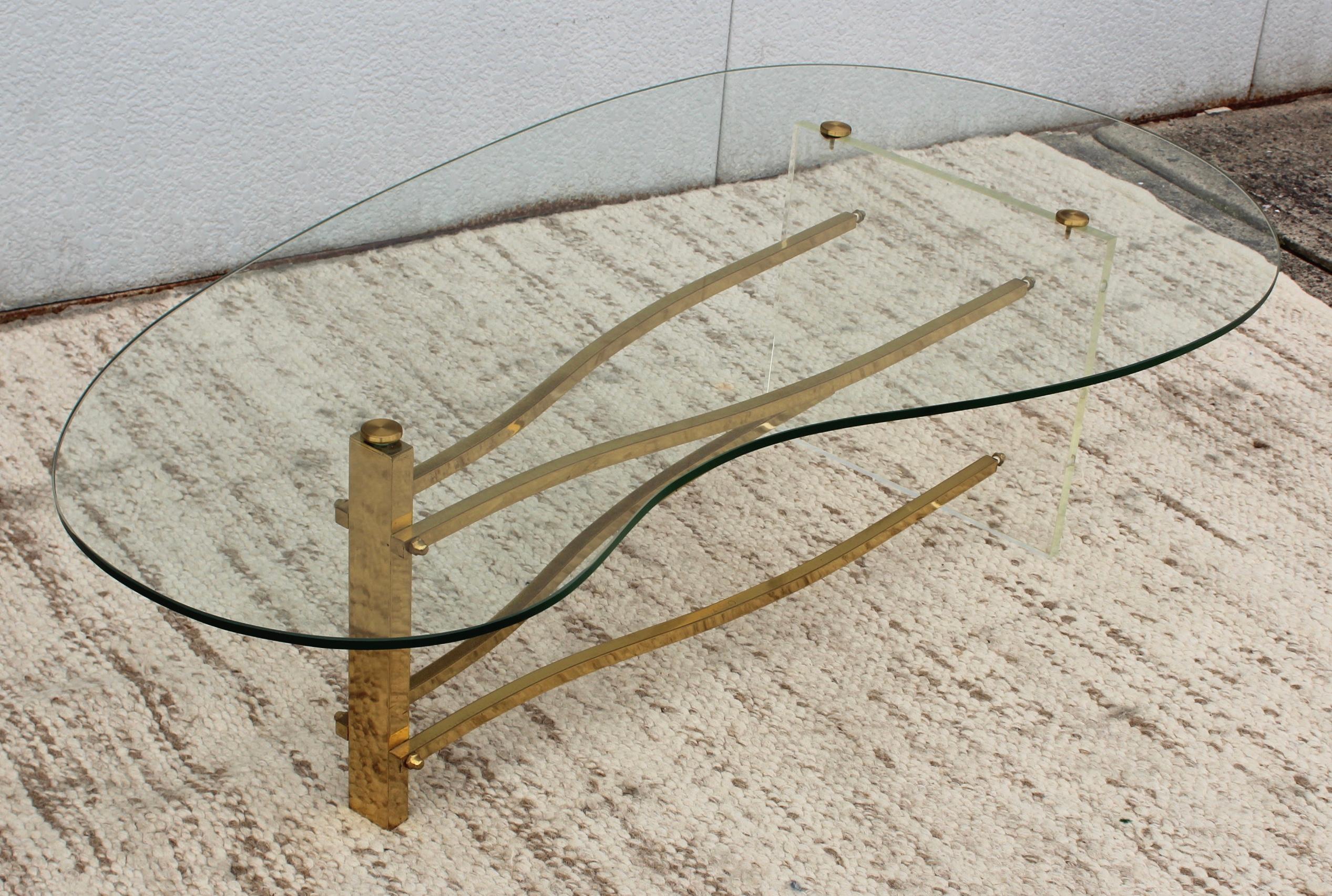 1960's Mid-Century Modern kidney shape with brass and lucite base coffee table by Charles Hollis Jones, in vintage original condition with some wear and patina due to age and use.