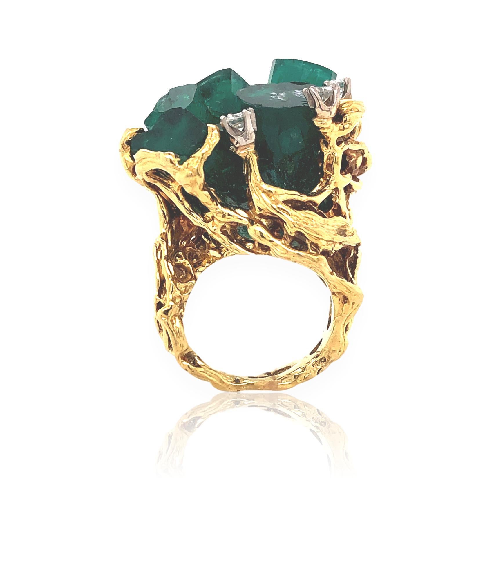 Organic rough emerald and diamond ring. The 18k  1