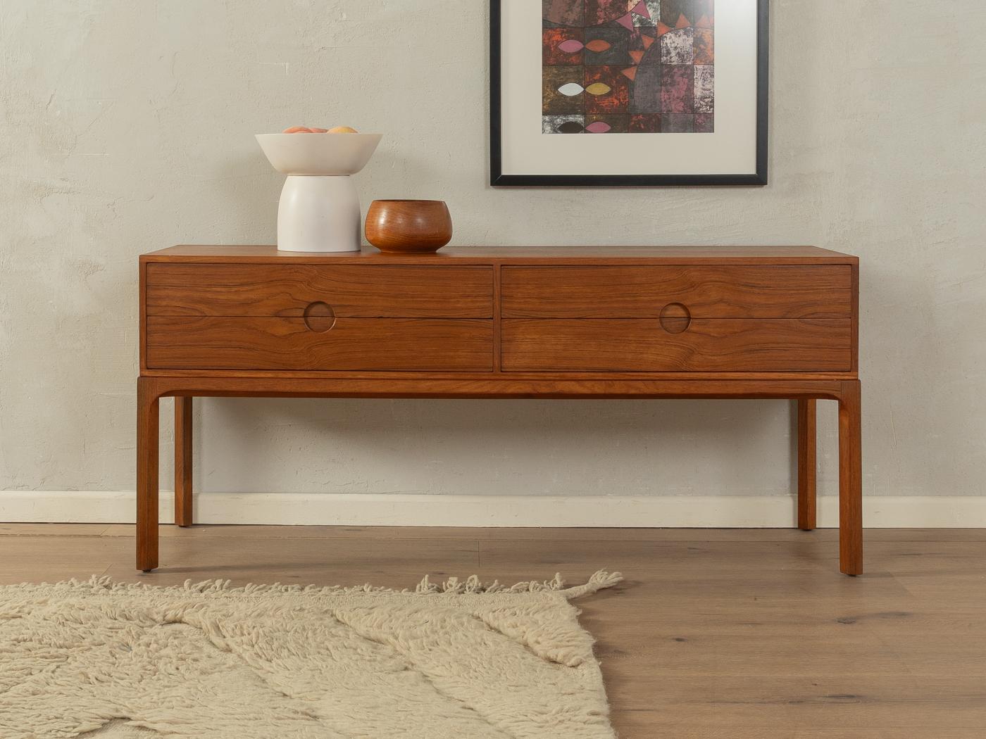 Wonderful chest of drawers, model 394, by Kai Kristiansen for Aksel Kjersgaard from the 1960s. Corpus in teak veneer with four drawers and straight feet.
Quality Features:

    accomplished design: perfect proportions and visible attention to