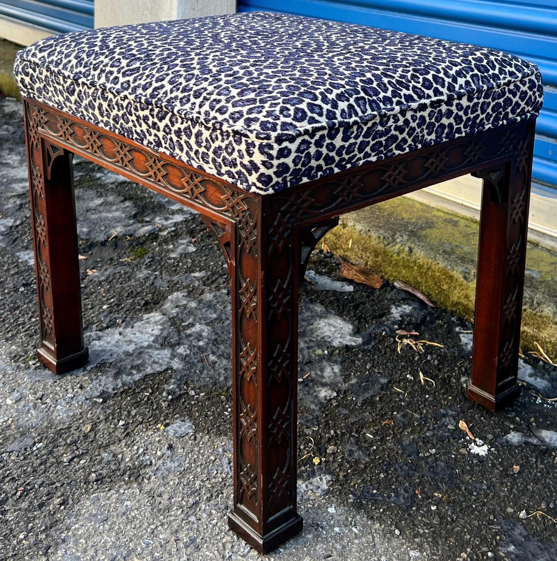 This is a set that pushes all of the buttons. It is by Kindel. The set is carved mahogany with Chinese Chippendale styling. The ottomans are newly upholstered in leopard. They measure 19”L x 16.5”W x 17.5”H. The console is marked.

My shipping is