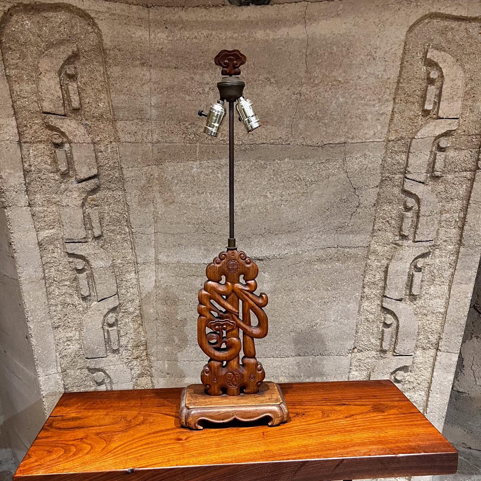 1960s Hand Carved Mahogany Wood Chinese Table Lamp
No shade.
Double socket with matching wood finial
30.25 h x 9 w x 5.5 d
Unmarked
Original vintage unrestored condition.
Refer to images.