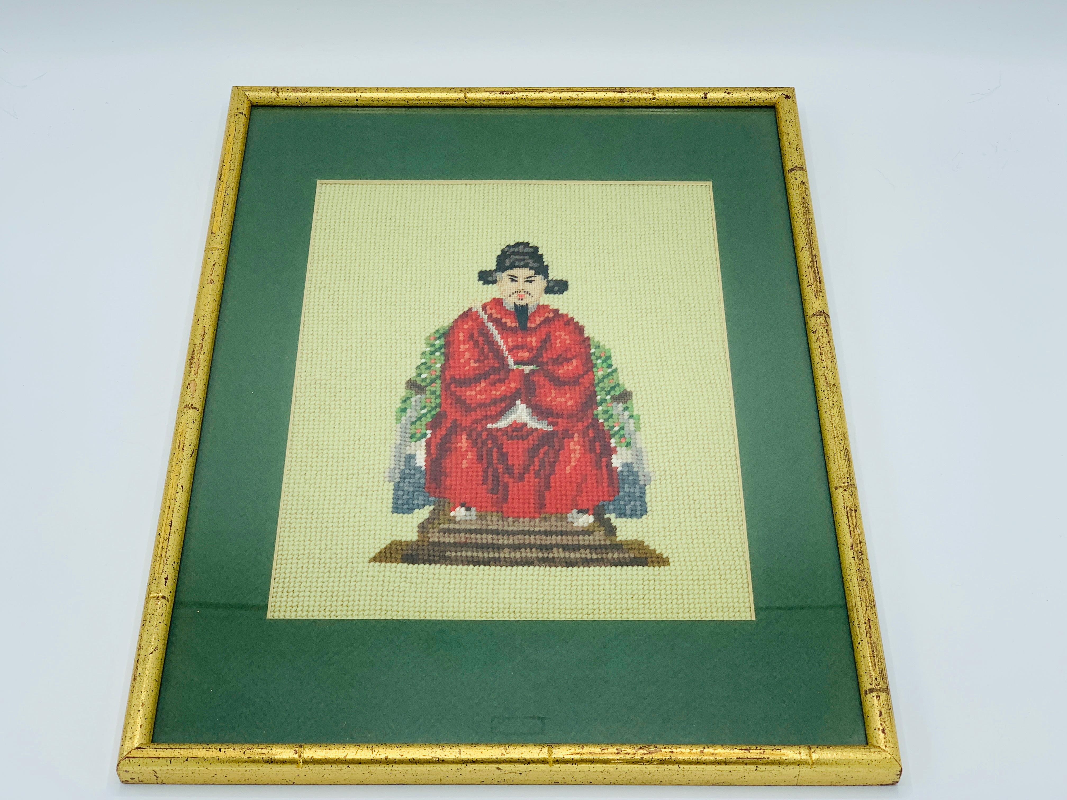 Listed is a fabulous, pair of chinoiserie emperor and empress framed needlepoints, circa 1960s. The pair are in incredible condition. Encased with a gilt faux bamboo frame and glass, with dark green matting. If these don't work as wall hanging art,