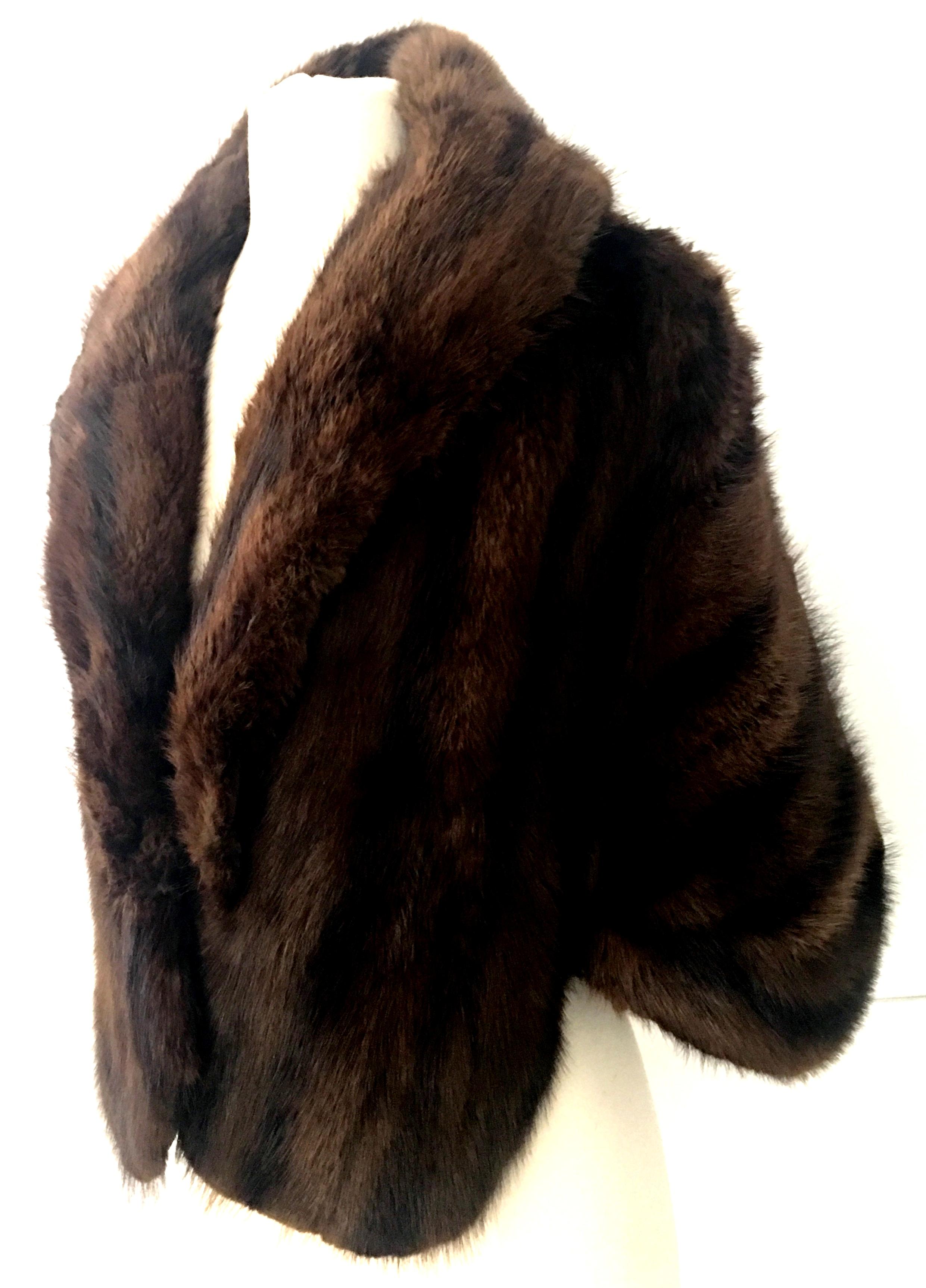 1960'S Mink  Fur Capelet-Jackiet in chocolate & black stripe. This fine quality high sheen soft and luxurious mink capelet features a generous roll over collar and two exterior side pockets. Fully lined with the original furrier tag in tact, Joeseph