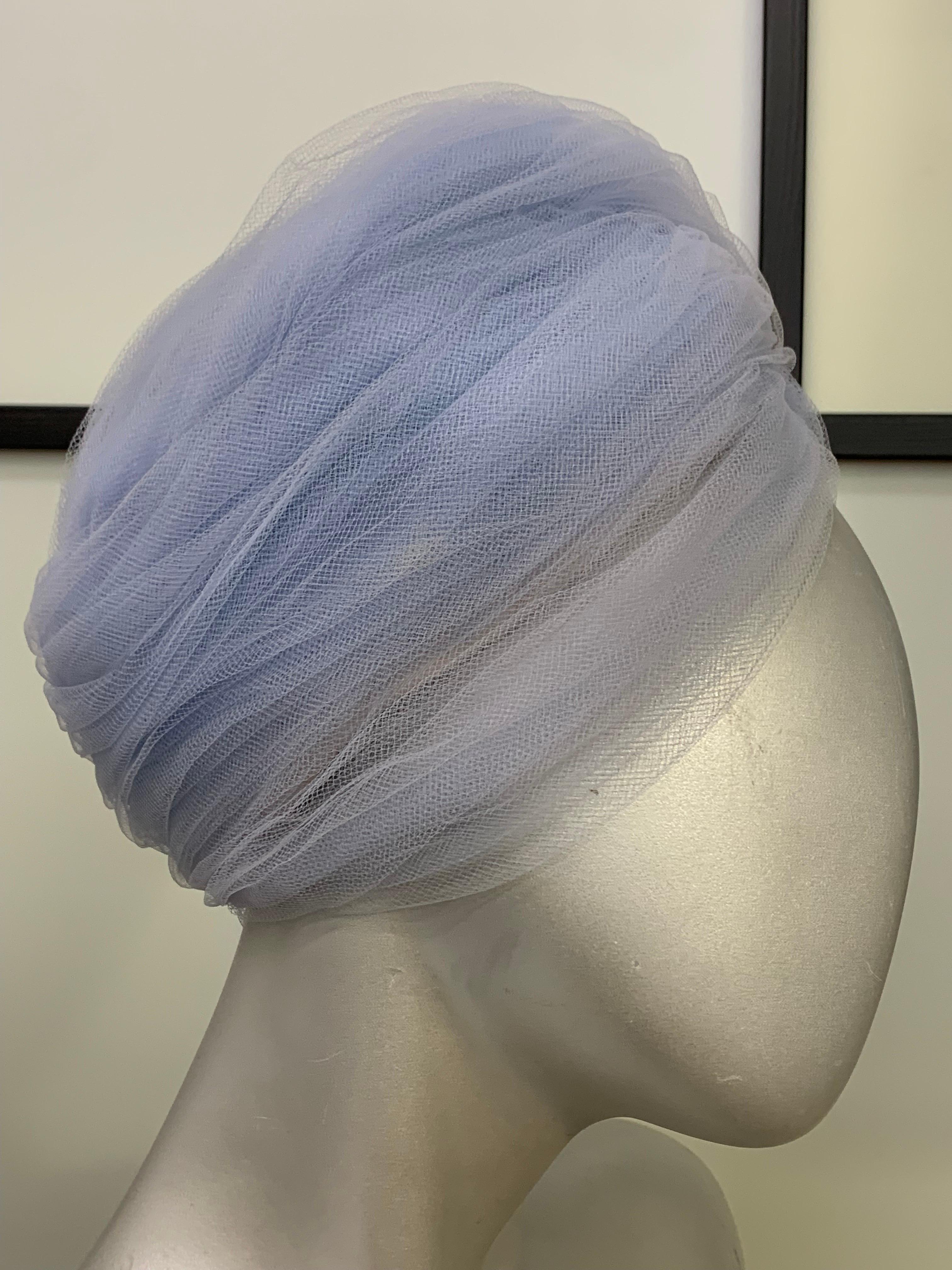 1960s Christian Dior Baby Blue Tulle Peaked Bubble Turban Hat:  A dramatic and stylish hat to be worn toward back of head with the hairline peeking out at front center, this is a high silhouette bubble shape. Gorgeous!  Size S-M. 