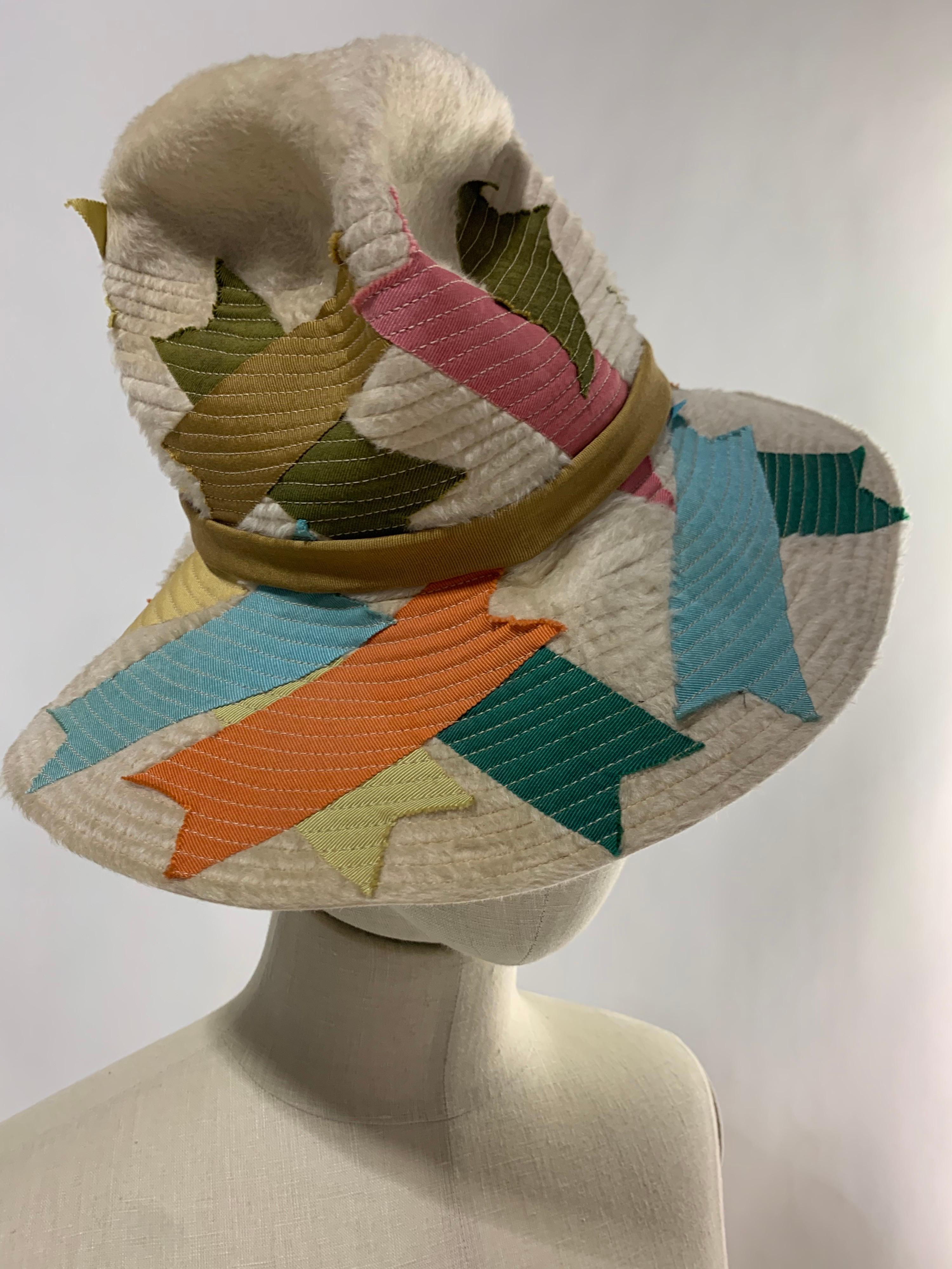 A charming and whimsical 1960s Christian Dior wool felt fedora in bone with multicolor grosgrain ribbon 