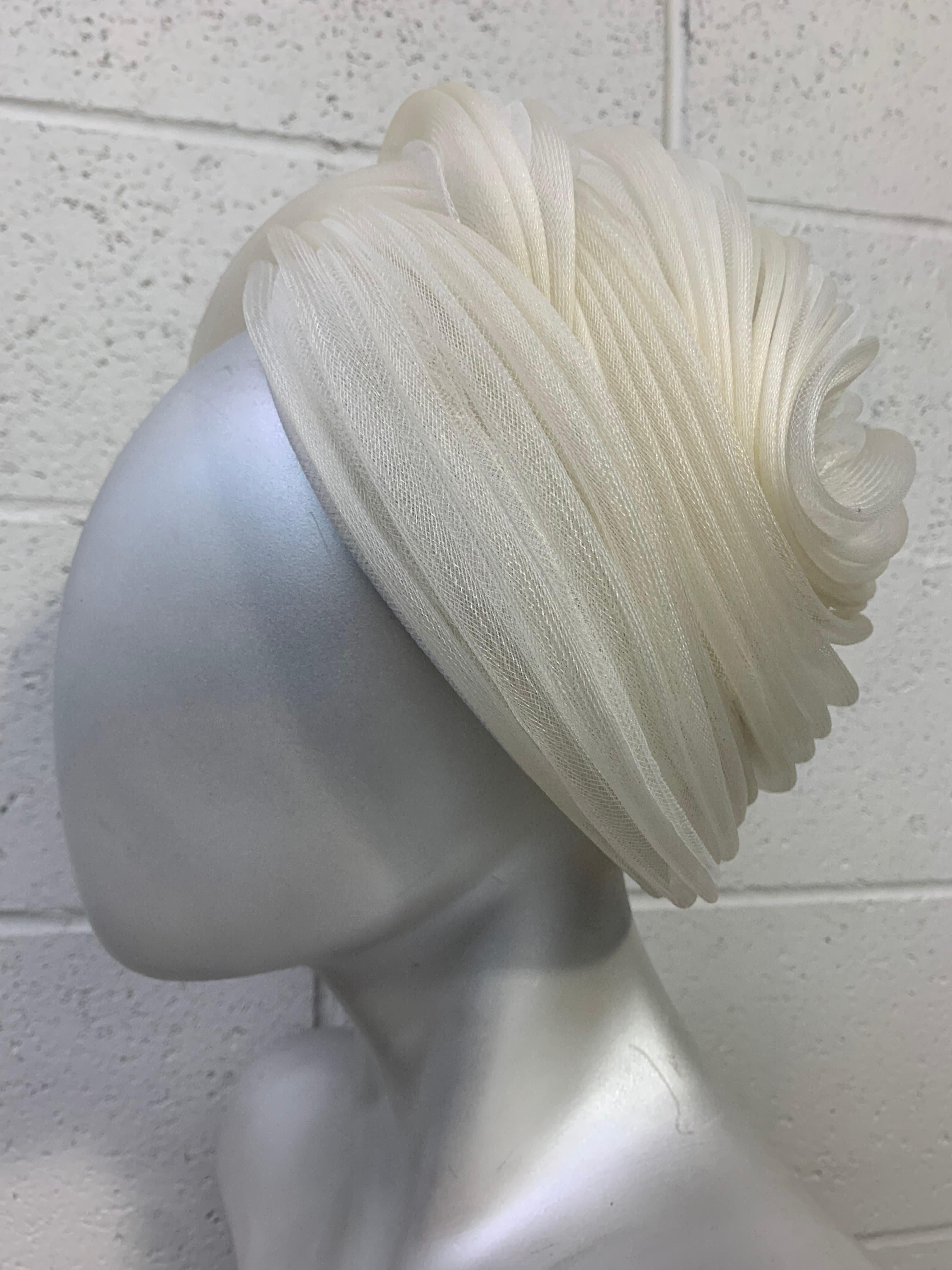 1960s Christian Dior Dramatic Snow White Coiled Tulle Turban: Stiffened bubble shape in sinuous coiled design to be worn at crown with center peak. Comes with original box. Hat is in pristine condition.  Size medium. 