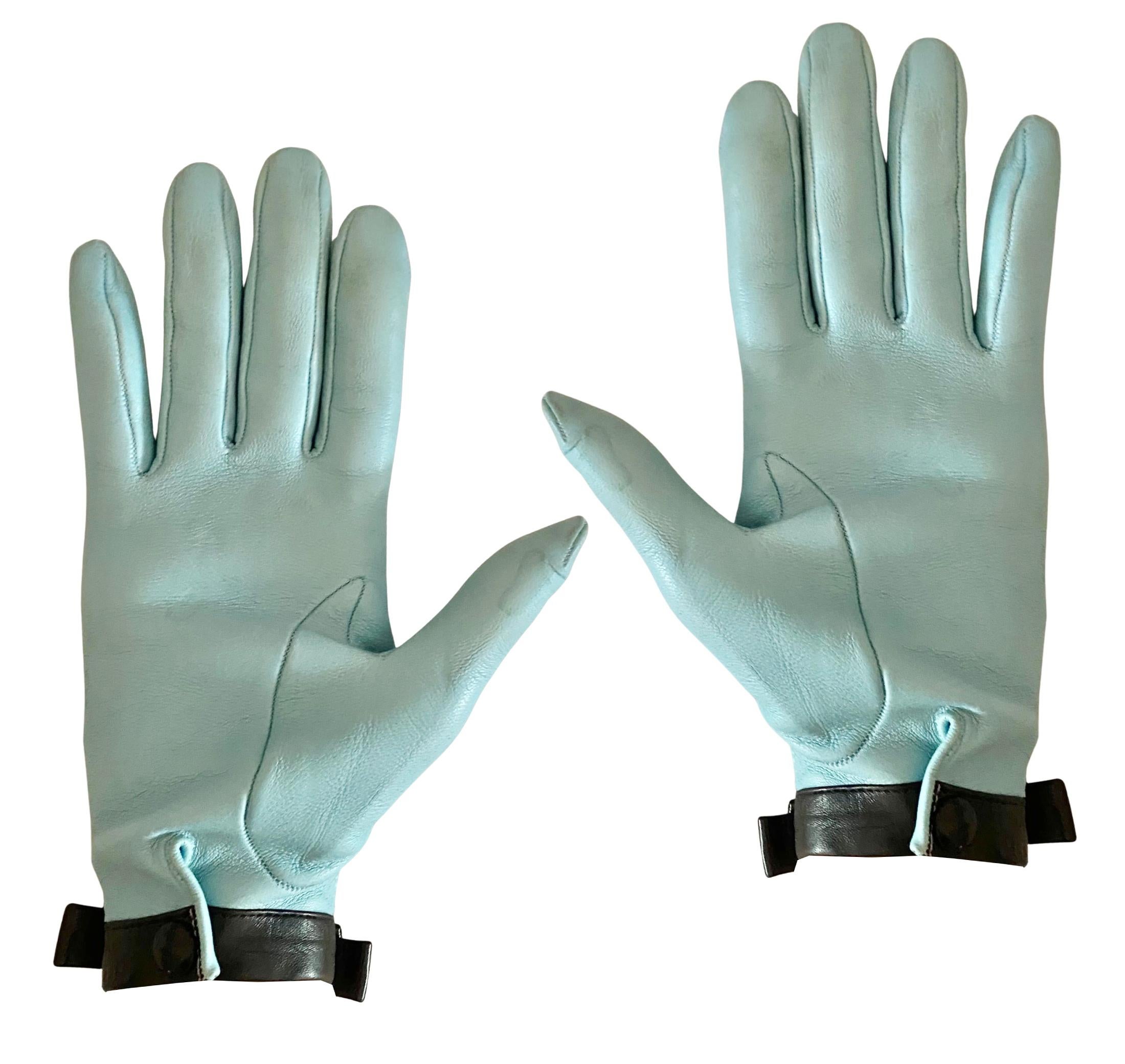 Christian Dior vintage gloves, a rare find that embodies the sophistication of mid-20th century couture accessories, Made in France 

Expertly crafted in buttery-soft sky blue leather, these gloves feature Dior’s signature attention to detail, with