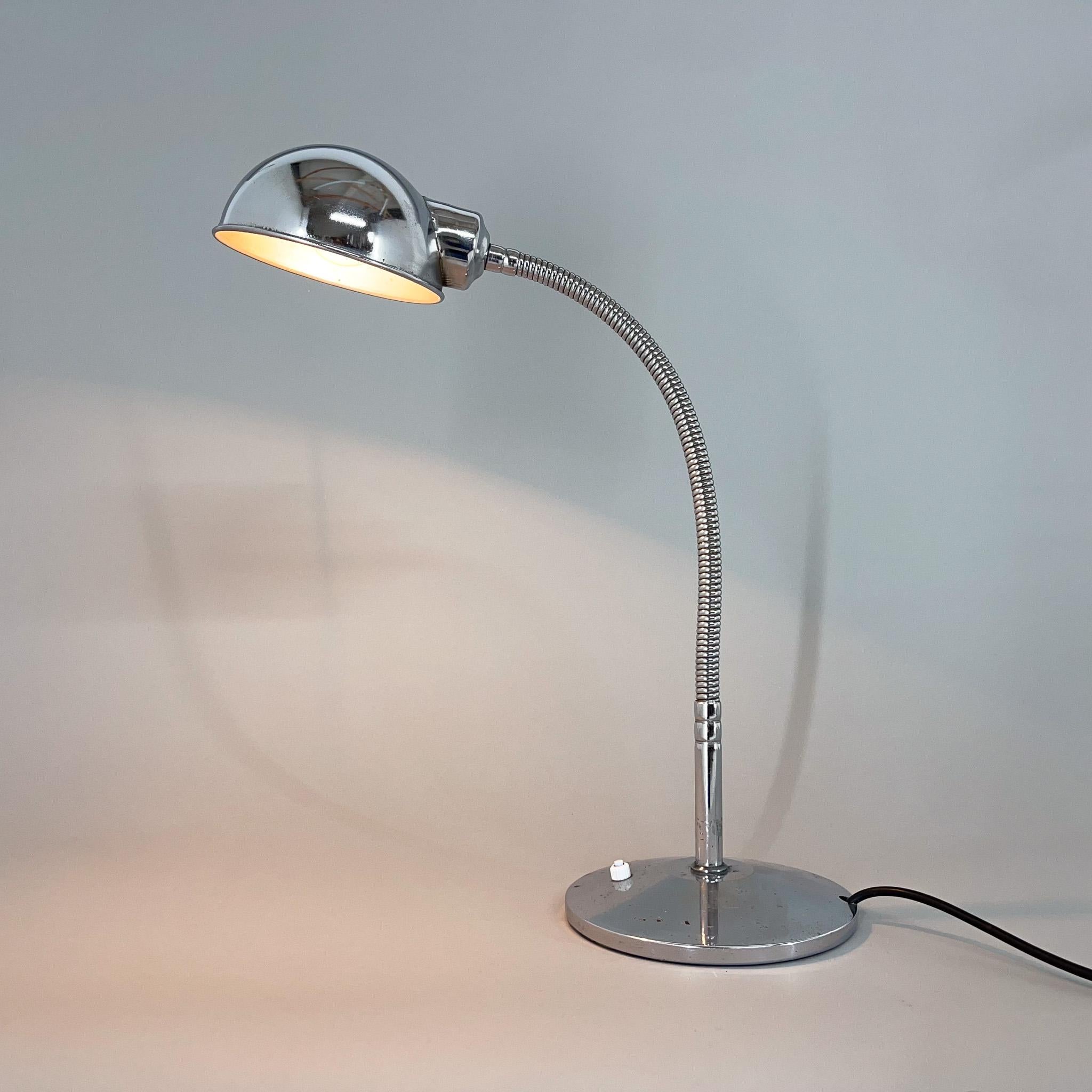 All-chrome table lamp, that is adjustable in all directions. New wiring, new switch. The maximum hight of the lamp is 64 cm. 
Bulbs: 1x 1 E26-27. US plug adapter included.