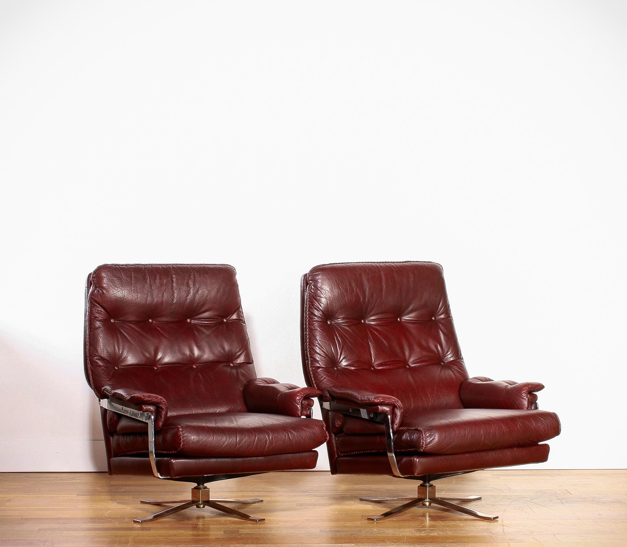 Steel 1960s, Chrome and Leather Swivel Lounge Chairs and Ottoman by Arne Norell