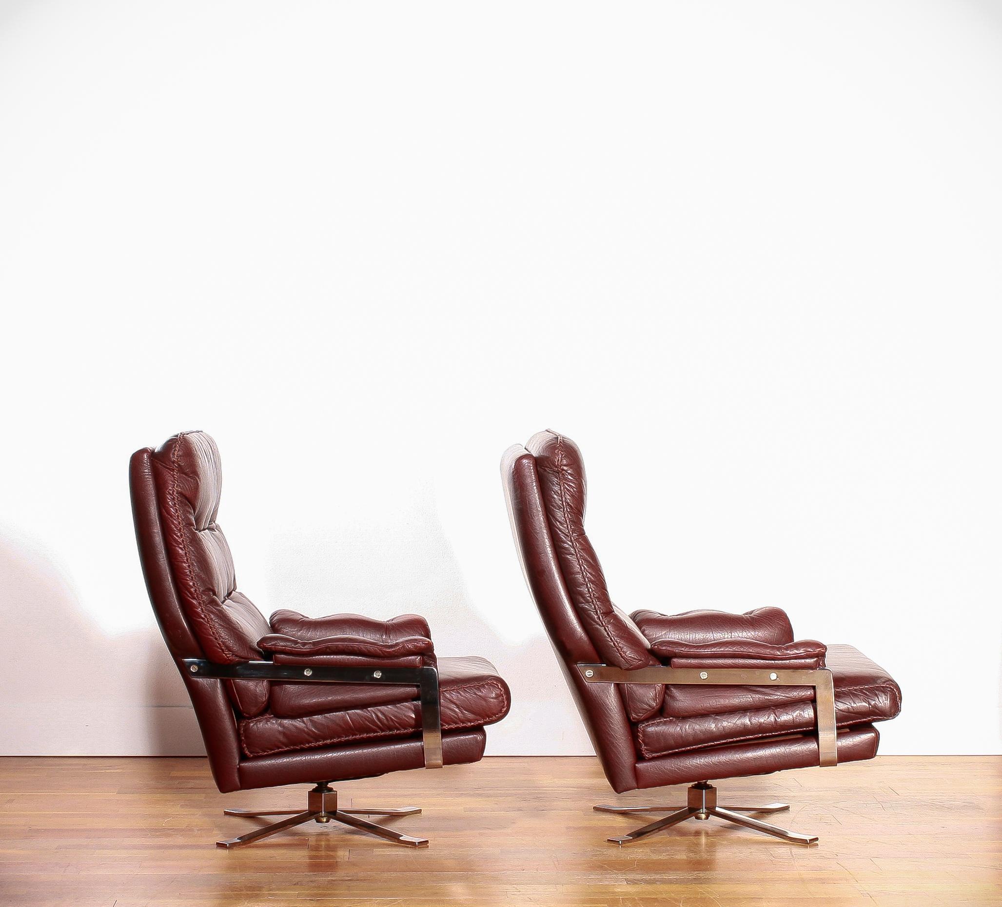 1960s, Chrome and Leather Swivel Lounge Chairs and Ottoman by Arne Norell 1