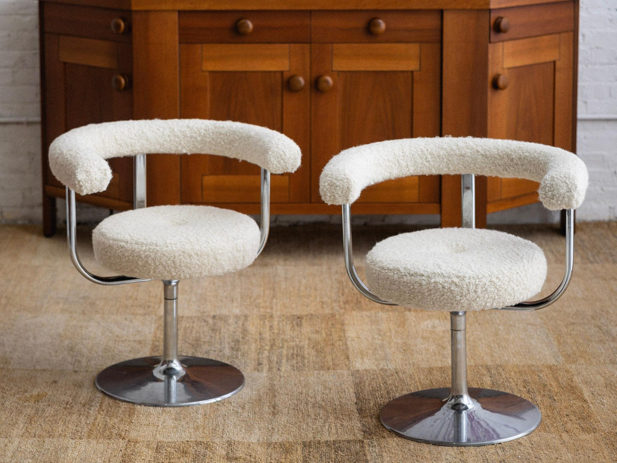 A 1960s pair of “Polar L-1001P” chairs by Esko Pajamies for Lepo, Finland. Rotating seats sit atop heavy tulip style chrome bases. Newly reupholstered in high quality soft wool teddy bouclé. Retains original “Lepo Finn” tags.