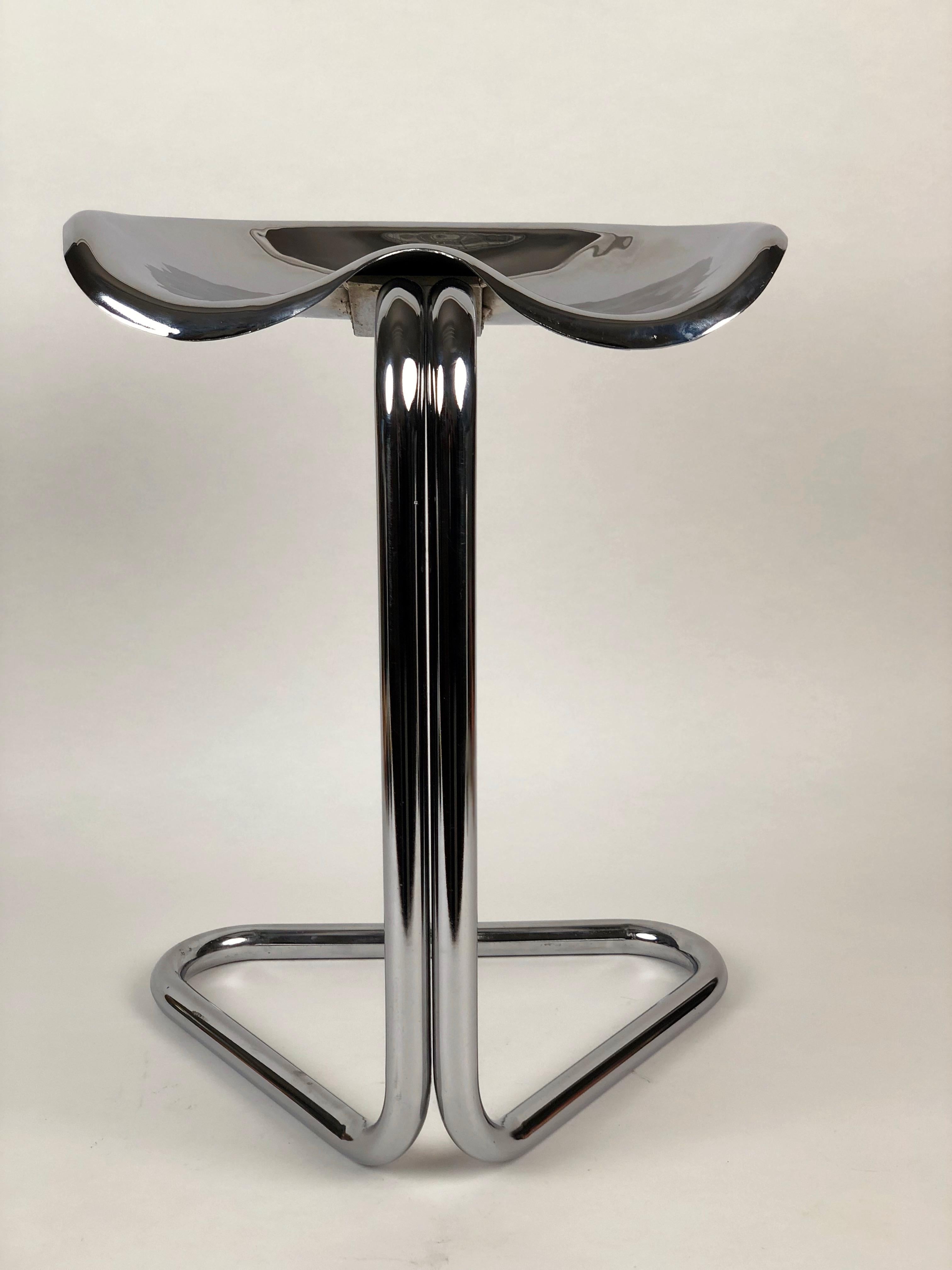 A stylish iconic tractor stool designed by Rodney Kinsman for OMK. It was made in England and dates from the 1960s.
The chrome steel is clean of rust. I find it surprisingly comfortable as well as beautiful to look at.