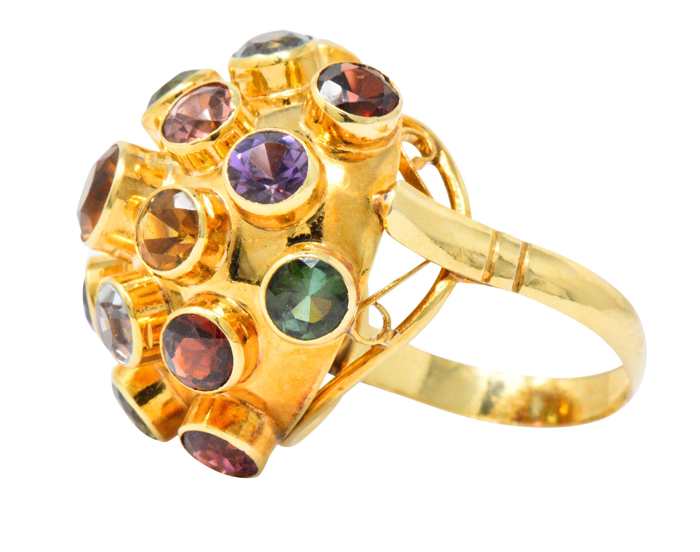 Bombé motif with round cut gemstones, including citrine, aquamarine, garnet, amethyst and more

All bezel set and of varying heights 

Inspired by the first man-made satellite Sputnik 

Ring Size: 6 1/2 & Sizable

Top measures 24.5 mm and sits 14.5