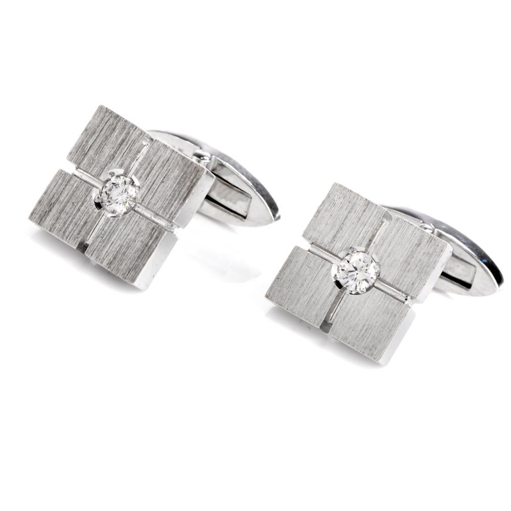  These luxurious diamond cufflinks are crafted in solid platinum weighing 11.4 grams and measuring 11mm. Centered with a pair of round-cut, prong-set diamonds, weighing approximately, 0.40 carats, graded F-G color and VS2 clarity. Embellished by a