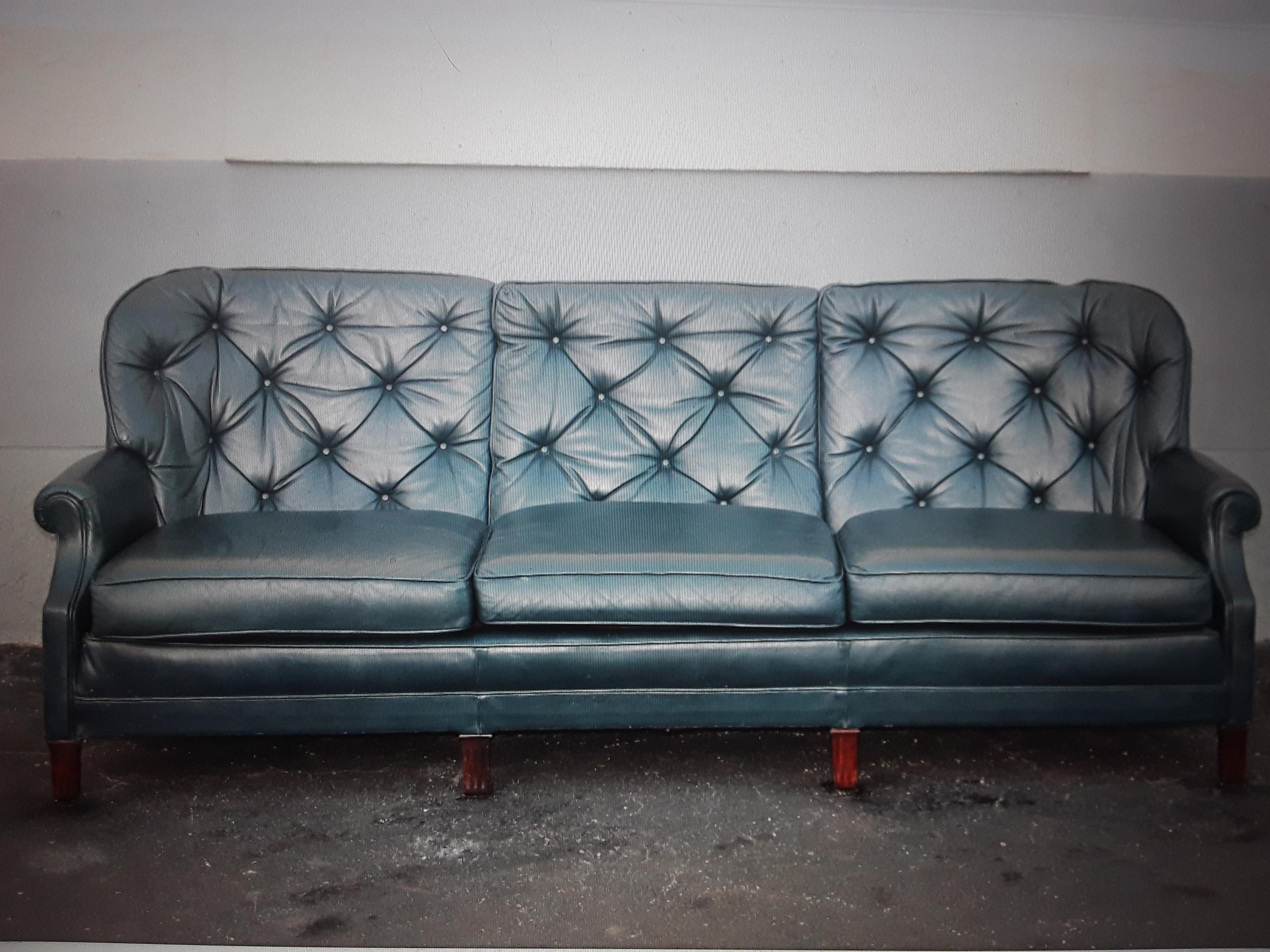 1960's Classic Mid Century Modern Blue Leather Chesterfield style Sofa. Beautiful blue leather. Miami estate purchase.