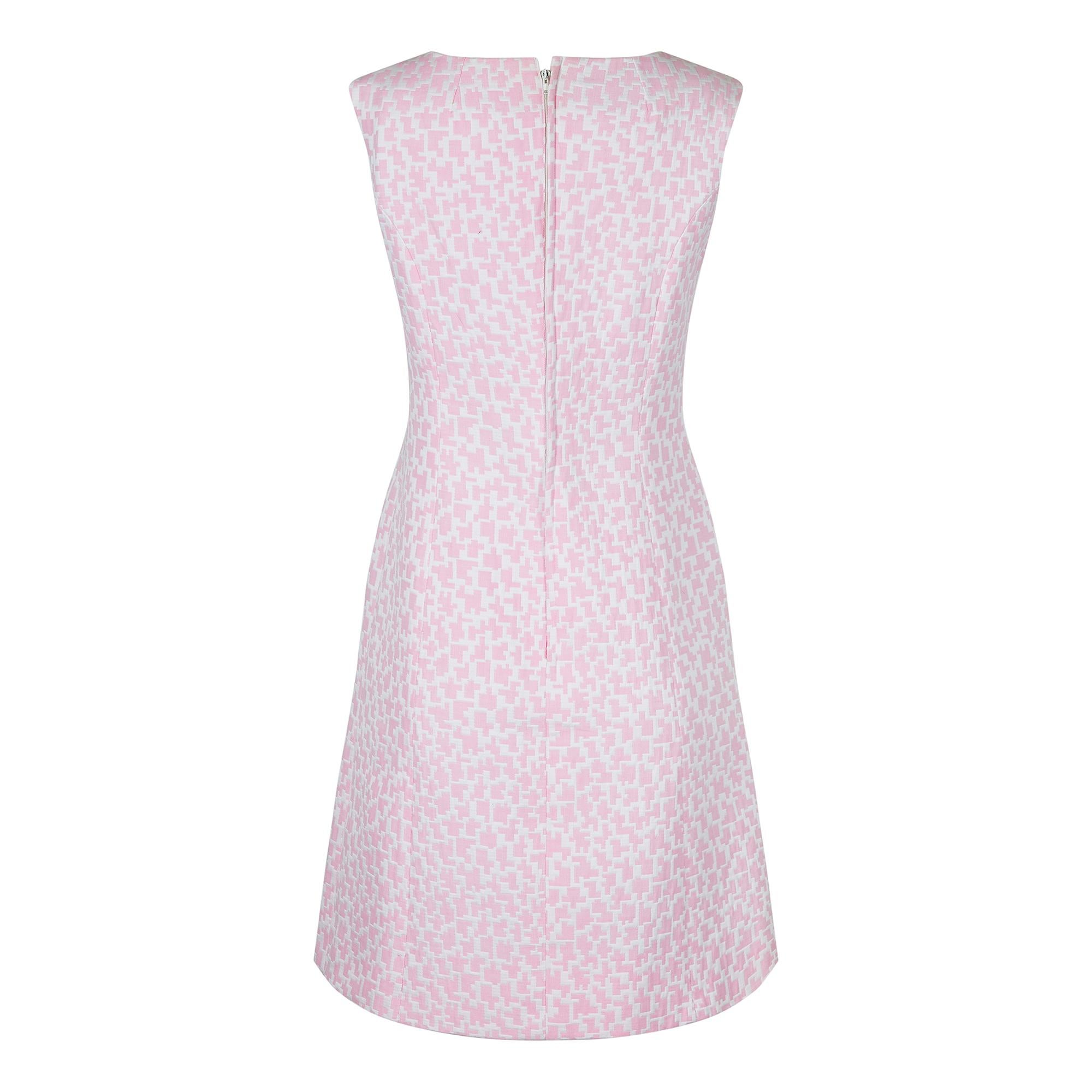 This is a great 1960s dress from upmarket British label Clevaline. We have often seen this label together with a Harrods retail label who only sold the very best fashion lines during the 50s and 60s. This is a delightful textured cotton dress in