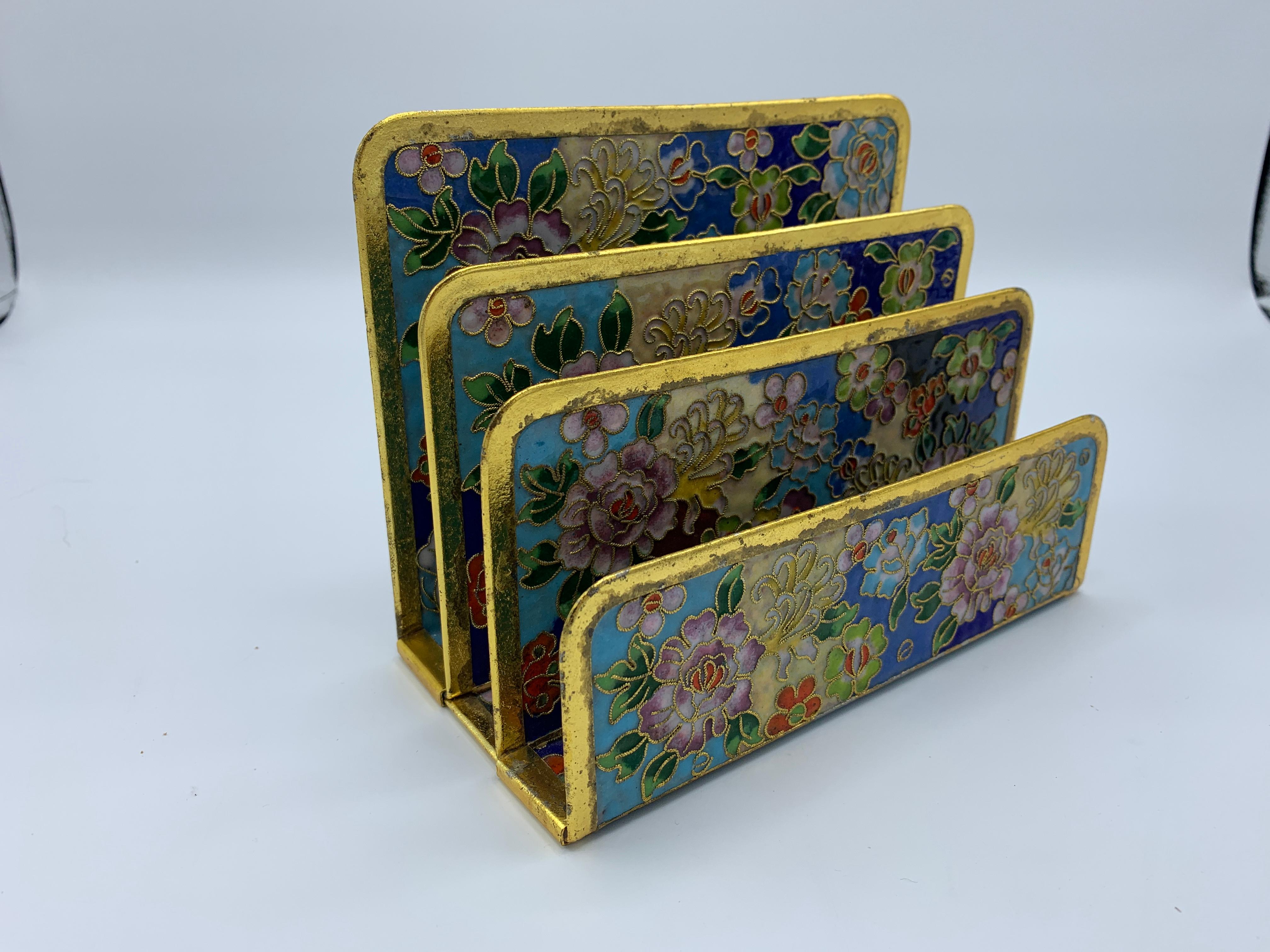 Listed is a rare and fabulous, 1960s Cloisonné letter organizer. The piece has an all-over floral motif and three evenly divided with varying heights. Heavy.