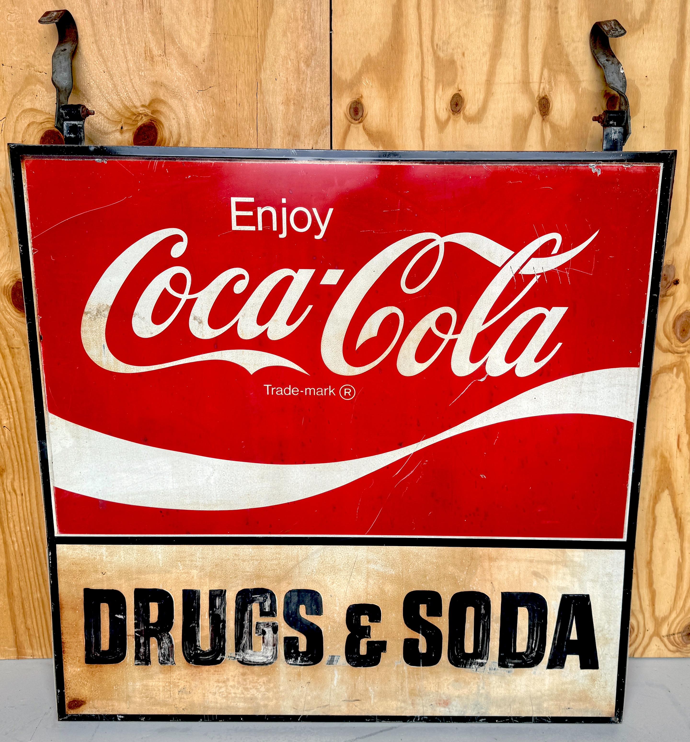 1960s Coca-Cola Trade Sign: 'Drugs & Soda' 
Salvaged from a pharmacy on Clematis Street, West Palm Beach, Florida 

A piece of Americana history: a 1960s Coca-Cola Trade Sign advertising 