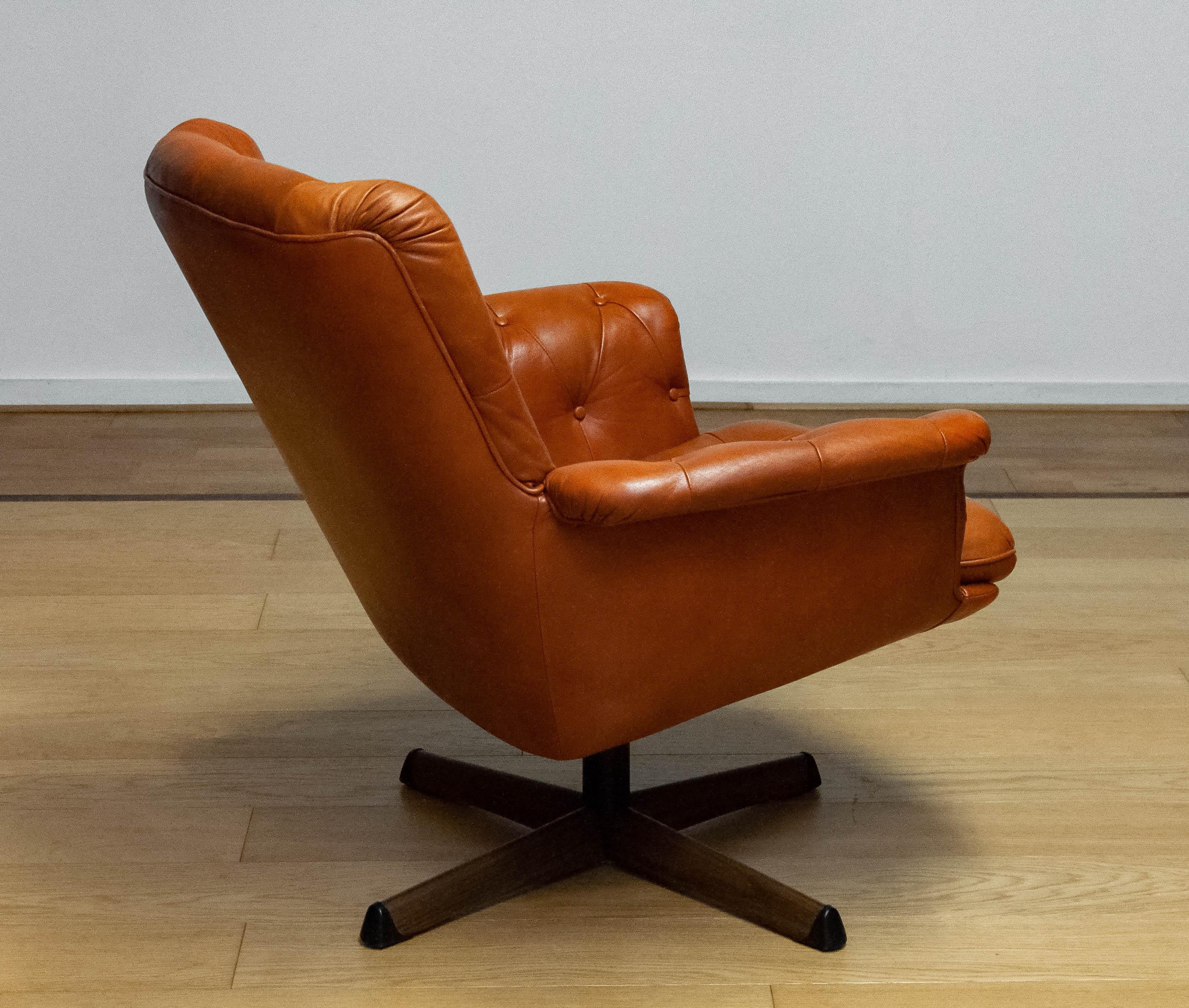 Mid-20th Century 1960s Cognac Leather EVA Swivel Chair Göte Nassjö Sweden. B For Sale