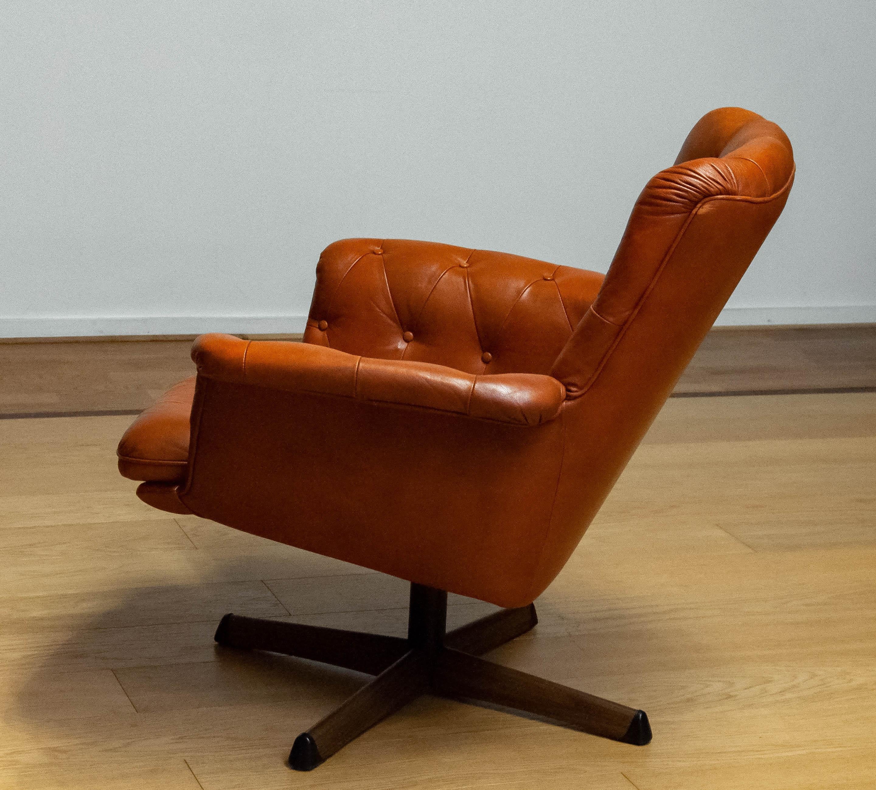 Metal 1960s Cognac Leather EVA Swivel Chair Göte Nassjö Sweden. B For Sale