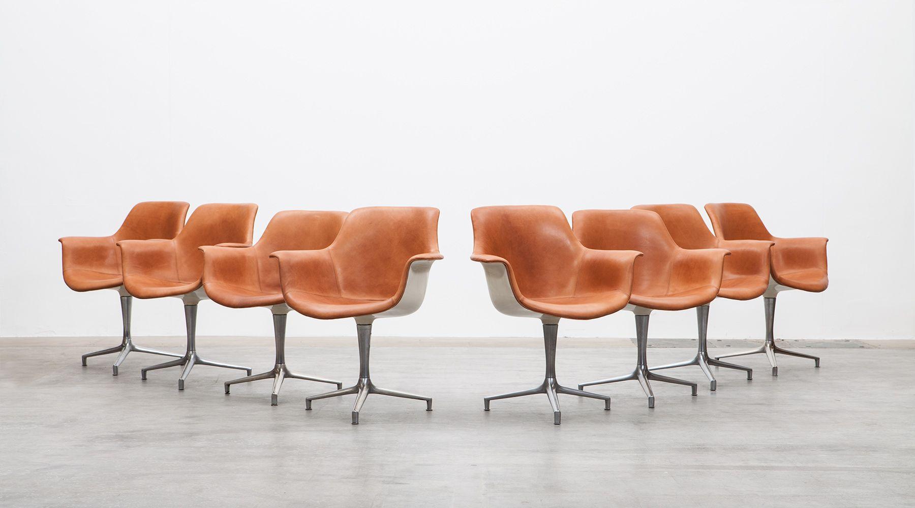 Six matching swivel chairs, brown leather, designed by Jorgen Kastholm, Denmark, 1965.

The seat and back of these swivel chairs are covered in cognac leather and designed by Jorgen Kastholm. The chairs promise a comfortable sitting feeling