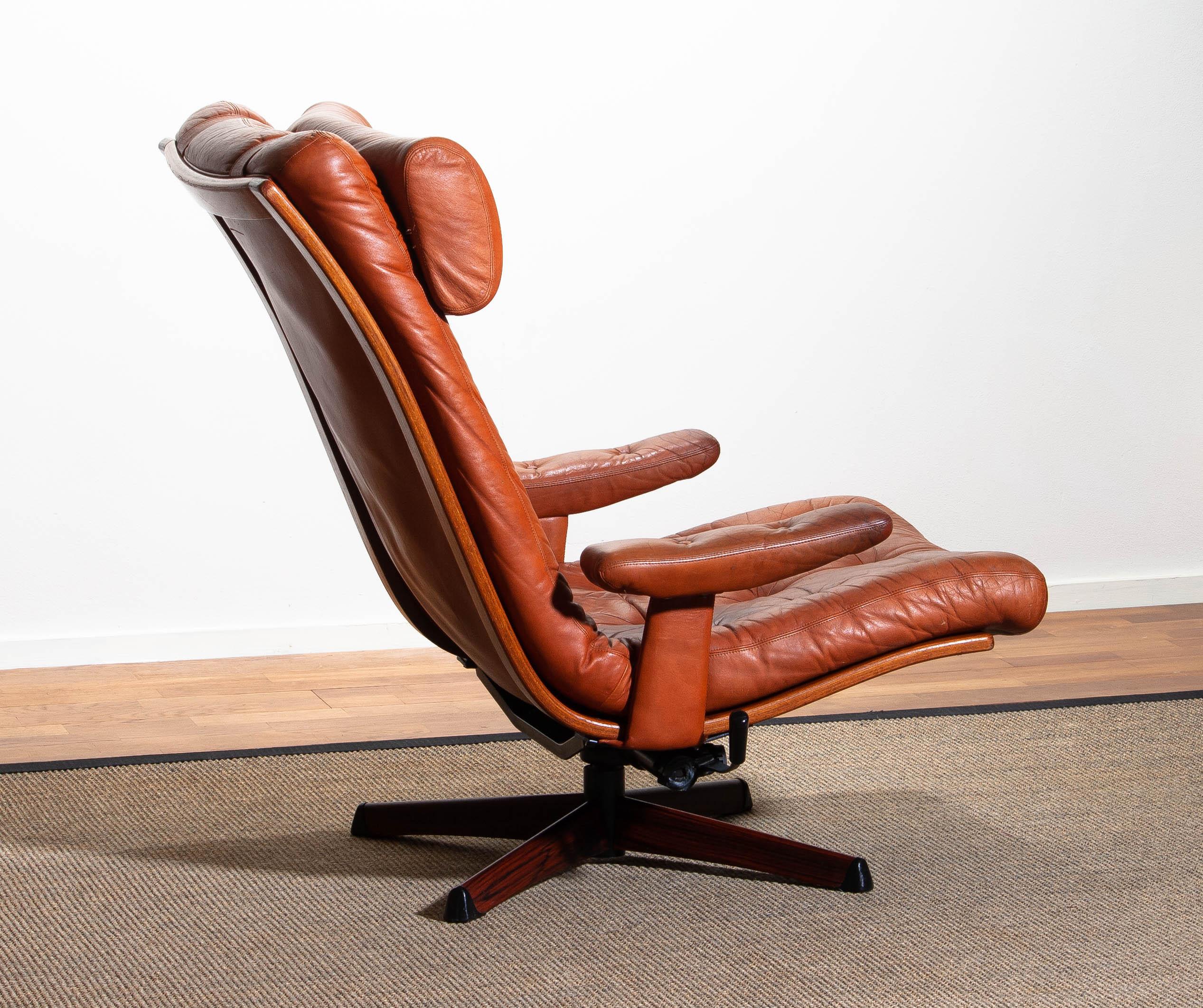 Mid-Century Modern 1960s, Cognac Leather Swivel / Relax Lounge Easy Chair by Göte Design Nässjö.