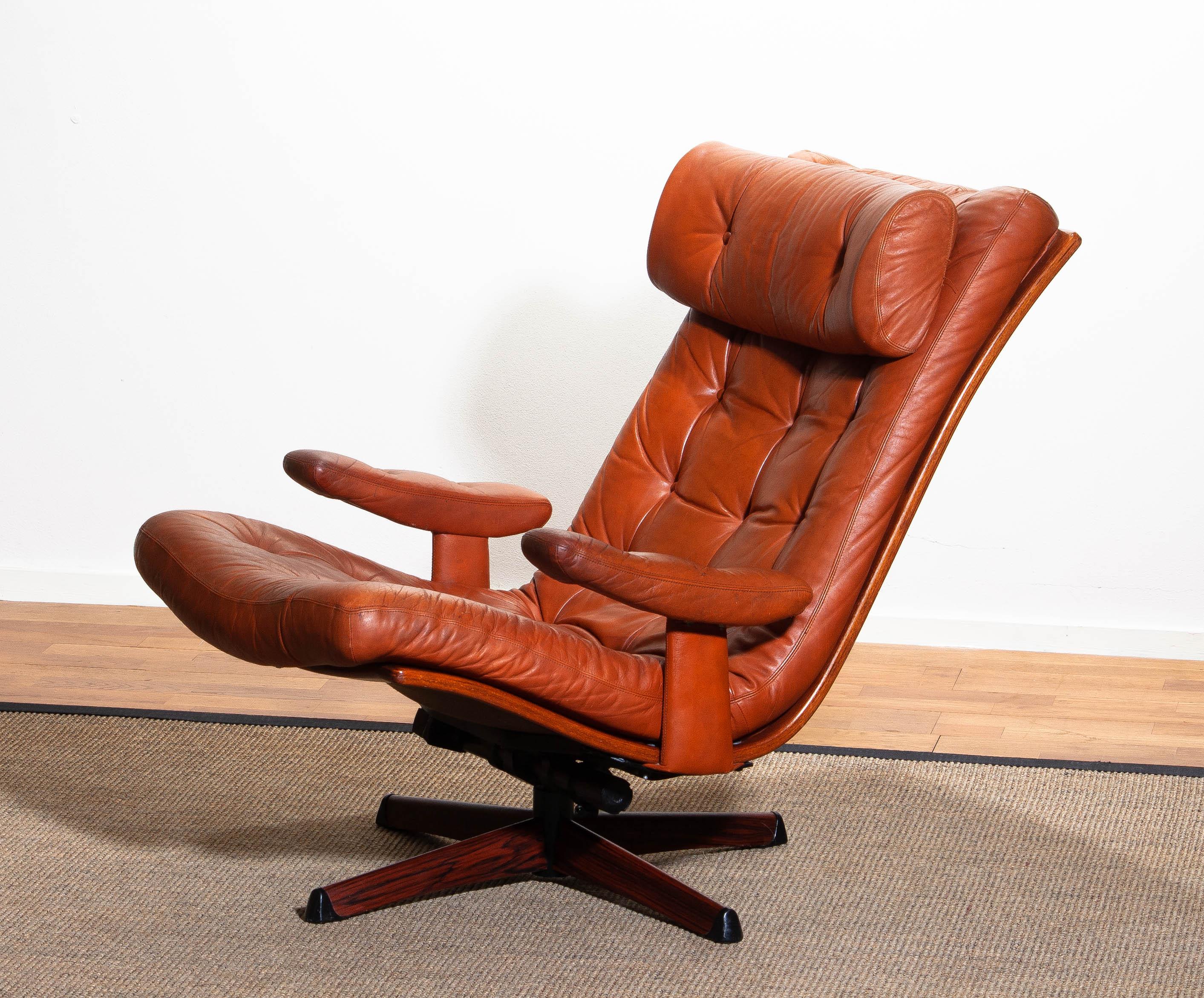 Mid-20th Century 1960s, Cognac Leather Swivel / Relax Lounge Easy Chair by Göte Design Nässjö.