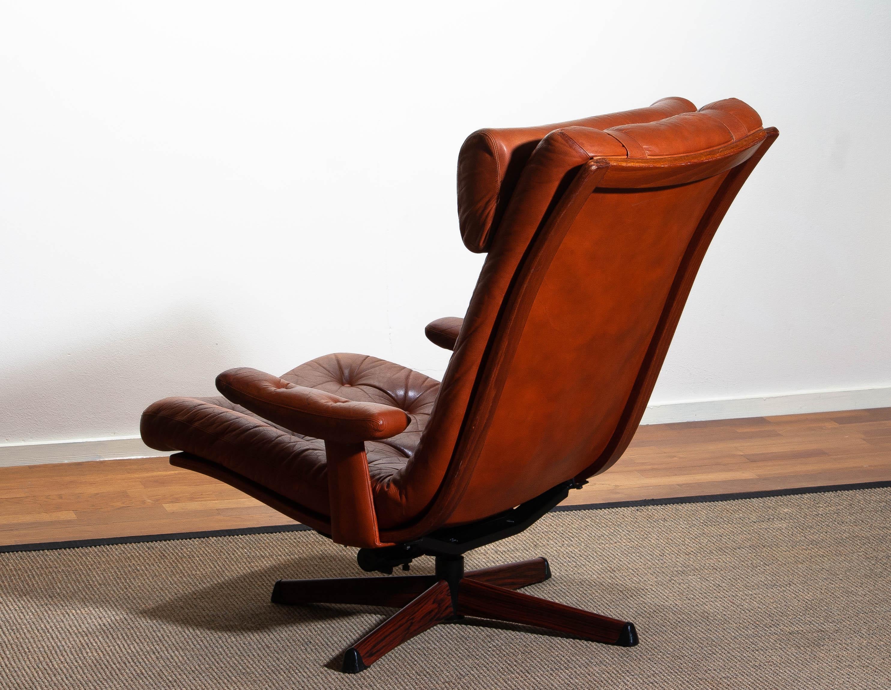 1960s, Cognac Leather Swivel / Relax Lounge Easy Chair by Göte Design Nässjö. 1