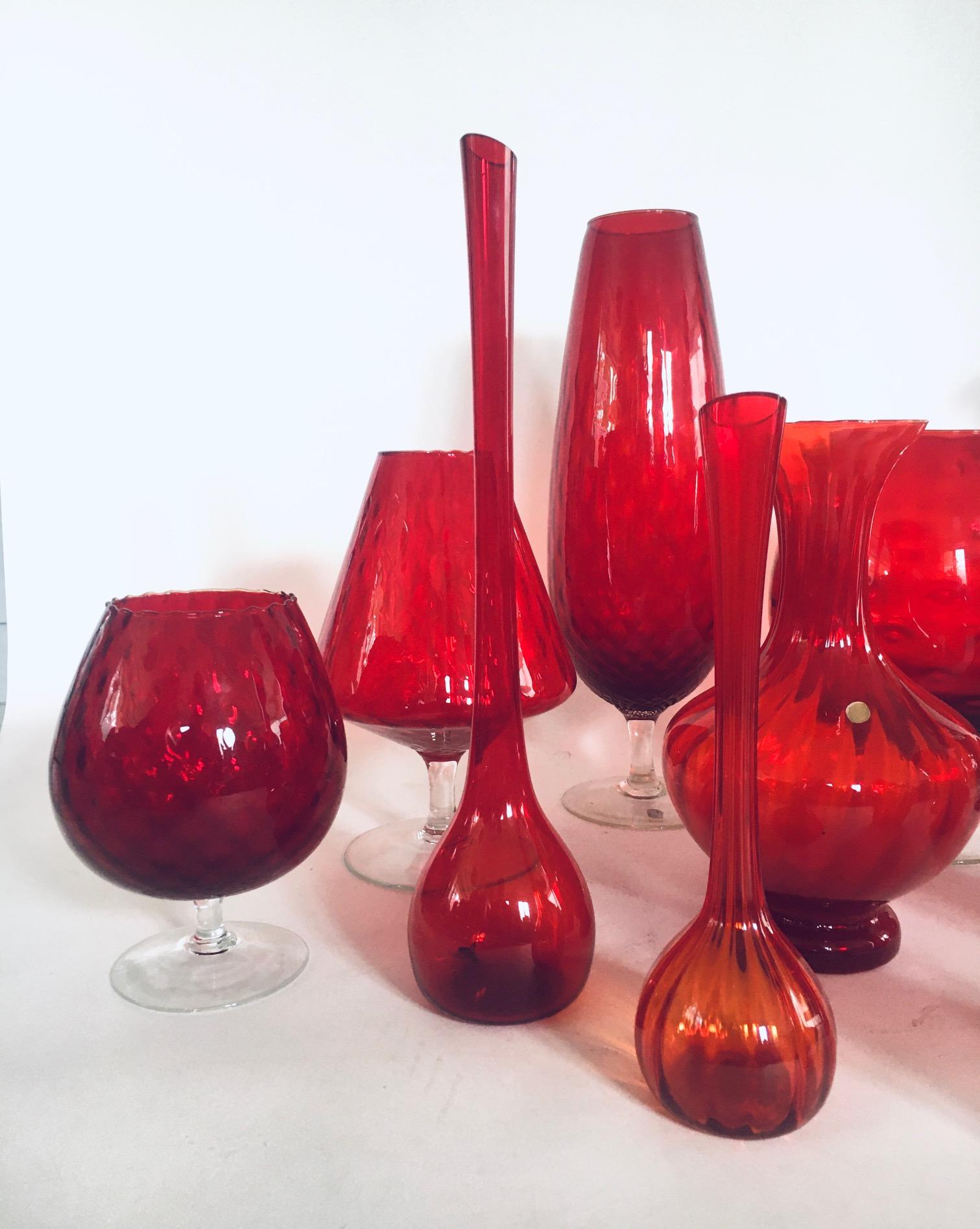 European 1960's Collection of 14 Vintage Red Glass Vases and Decanters For Sale