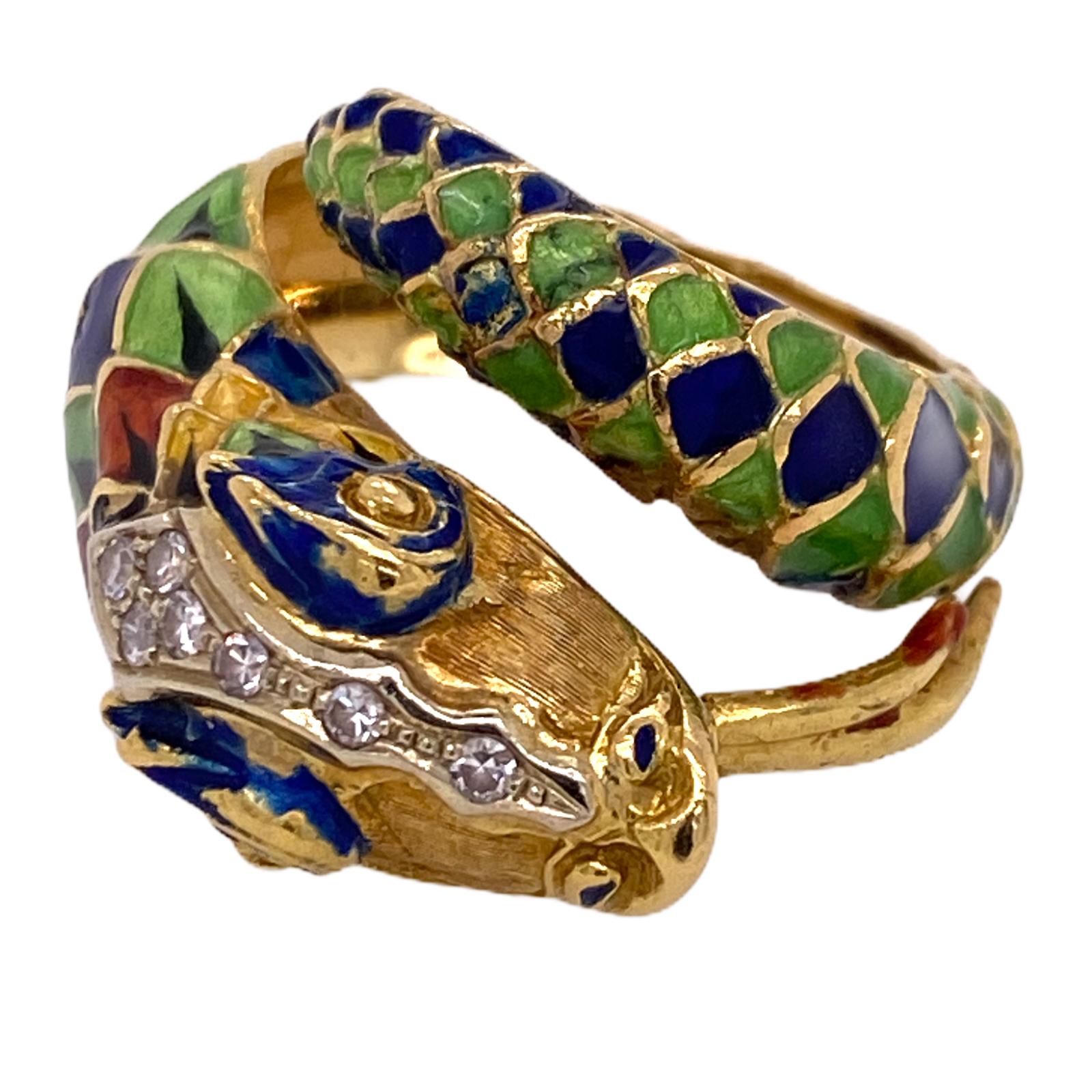 Fabulous enamel diamond snake ring hand crafted in 18 karat yellow gold. The snake ring features green, blue, and red enamel as well as 7 diamond accents (.10 carat total weight). The wrap around ring measures 15mm in width, 10mm in height, and is