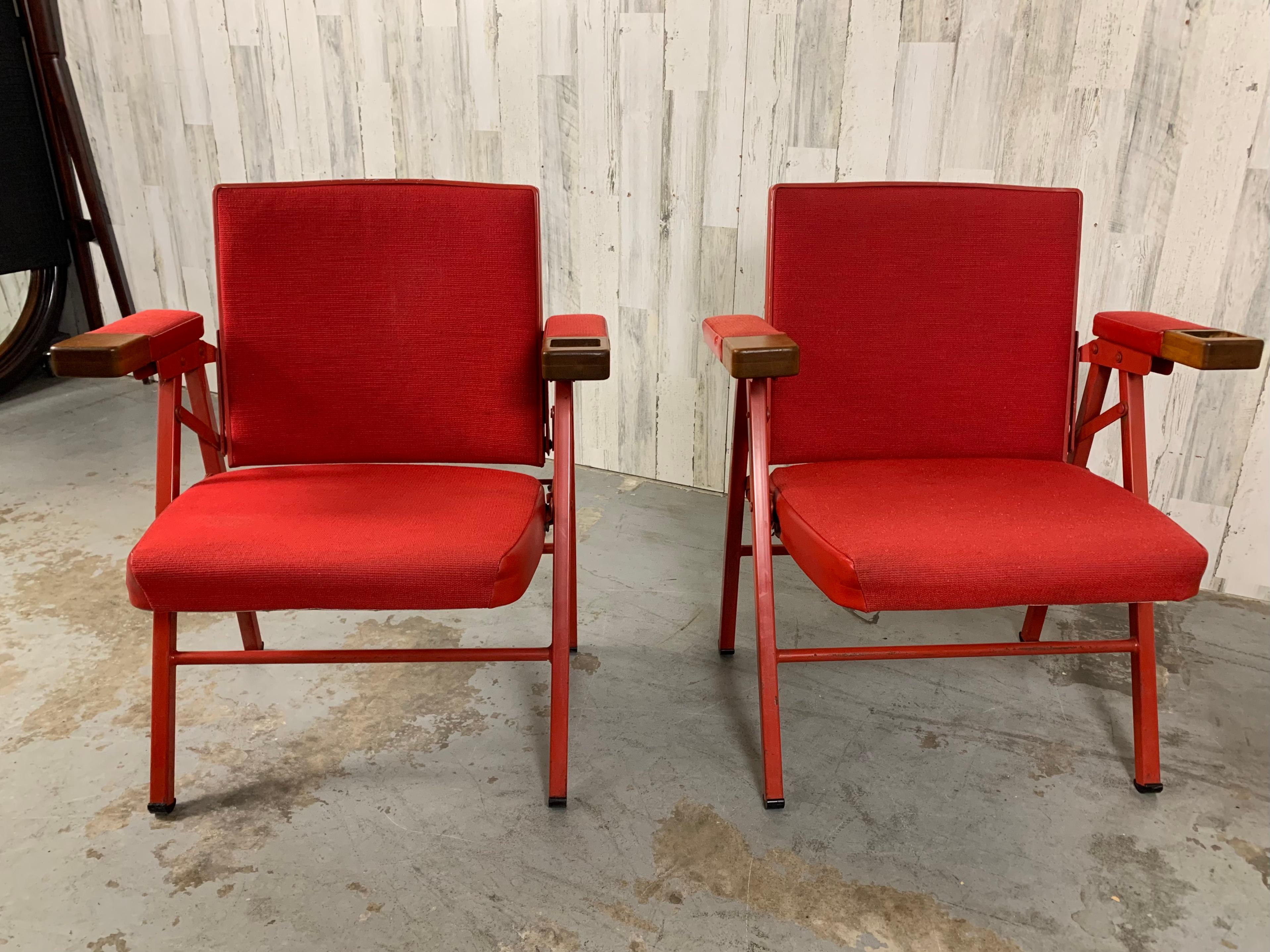 Pair of metal folding theater seats in good found condition, very comfortable and sturdy.                  
                                                                                                                                             