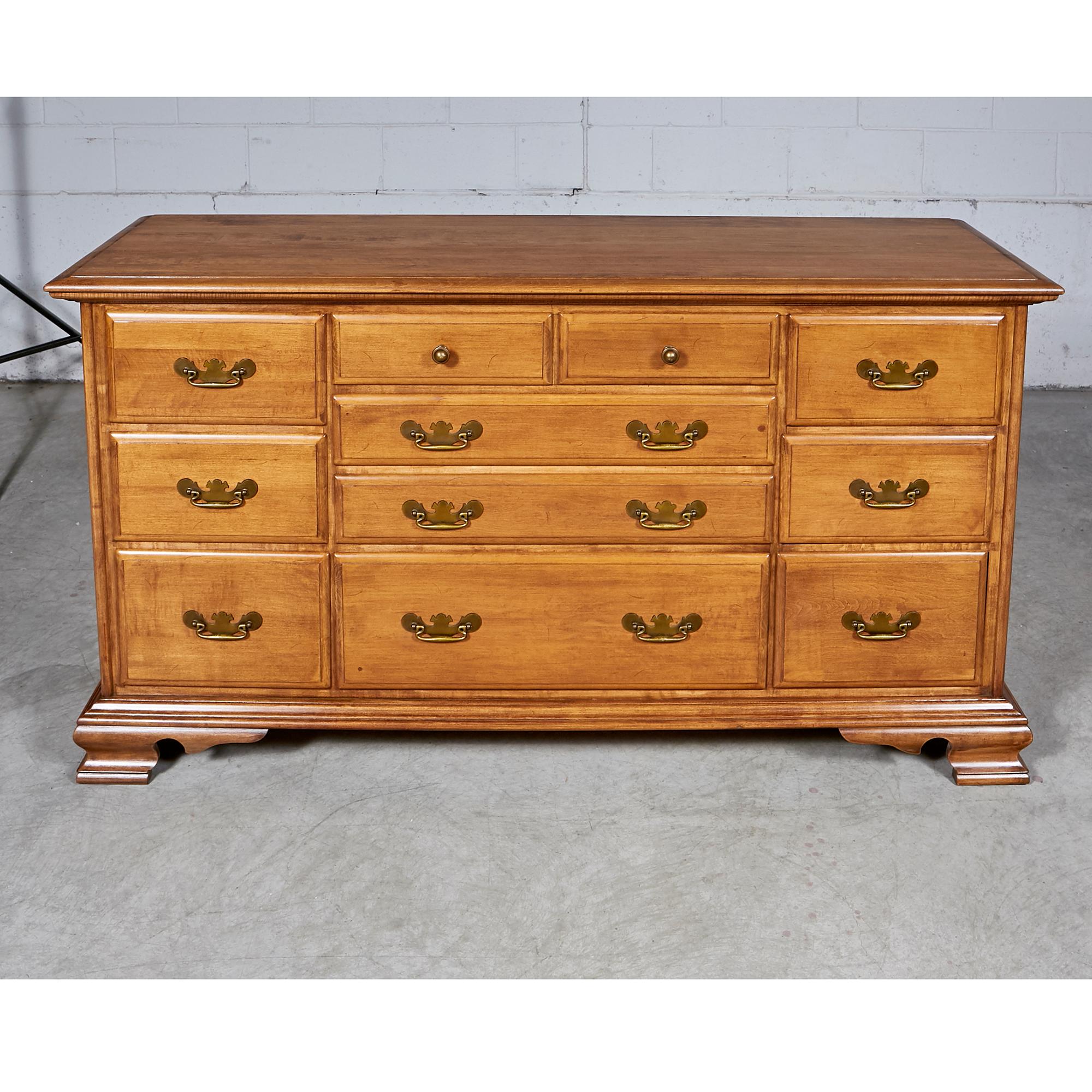 Vintage 1960s Conant Ball maple wood low dresser with 11 drawers for storage. In newly refinished condition. Marked in the drawer.