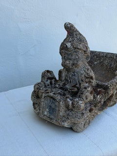 1960s Concrete Garden Gnome Driving Wheelbarrow with Rustic Pebble Finish