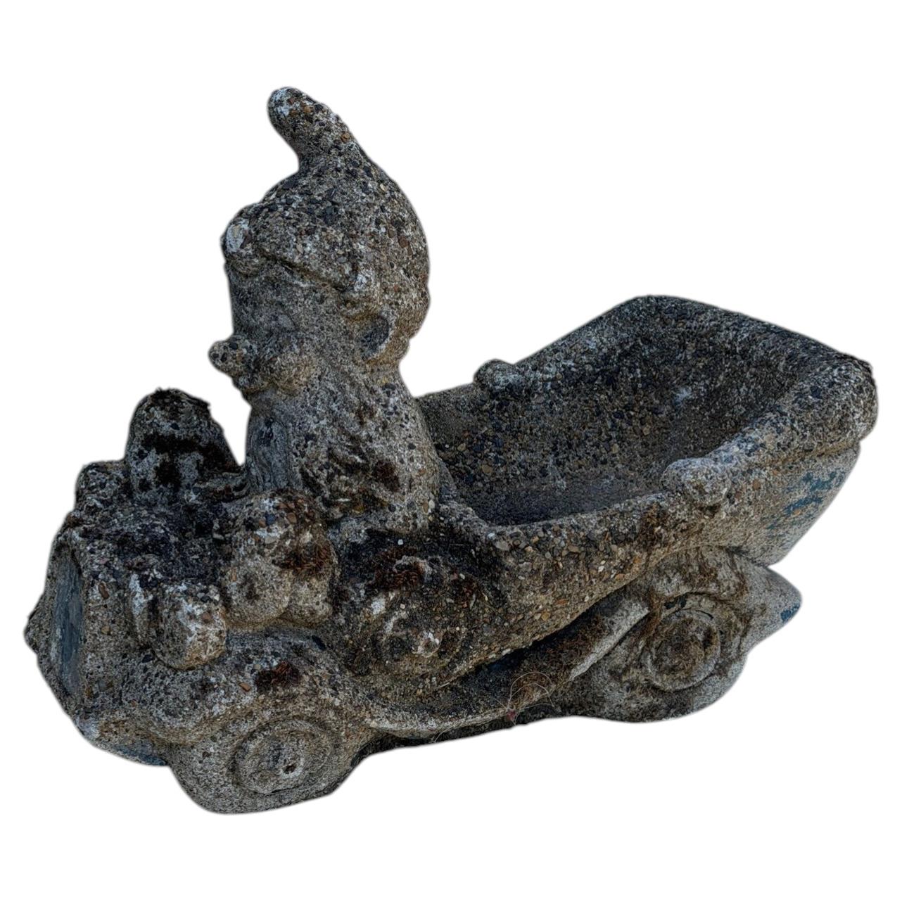 1960s Concrete Garden Gnome Driving Wheelbarrow with Rustic Pebble Finish For Sale