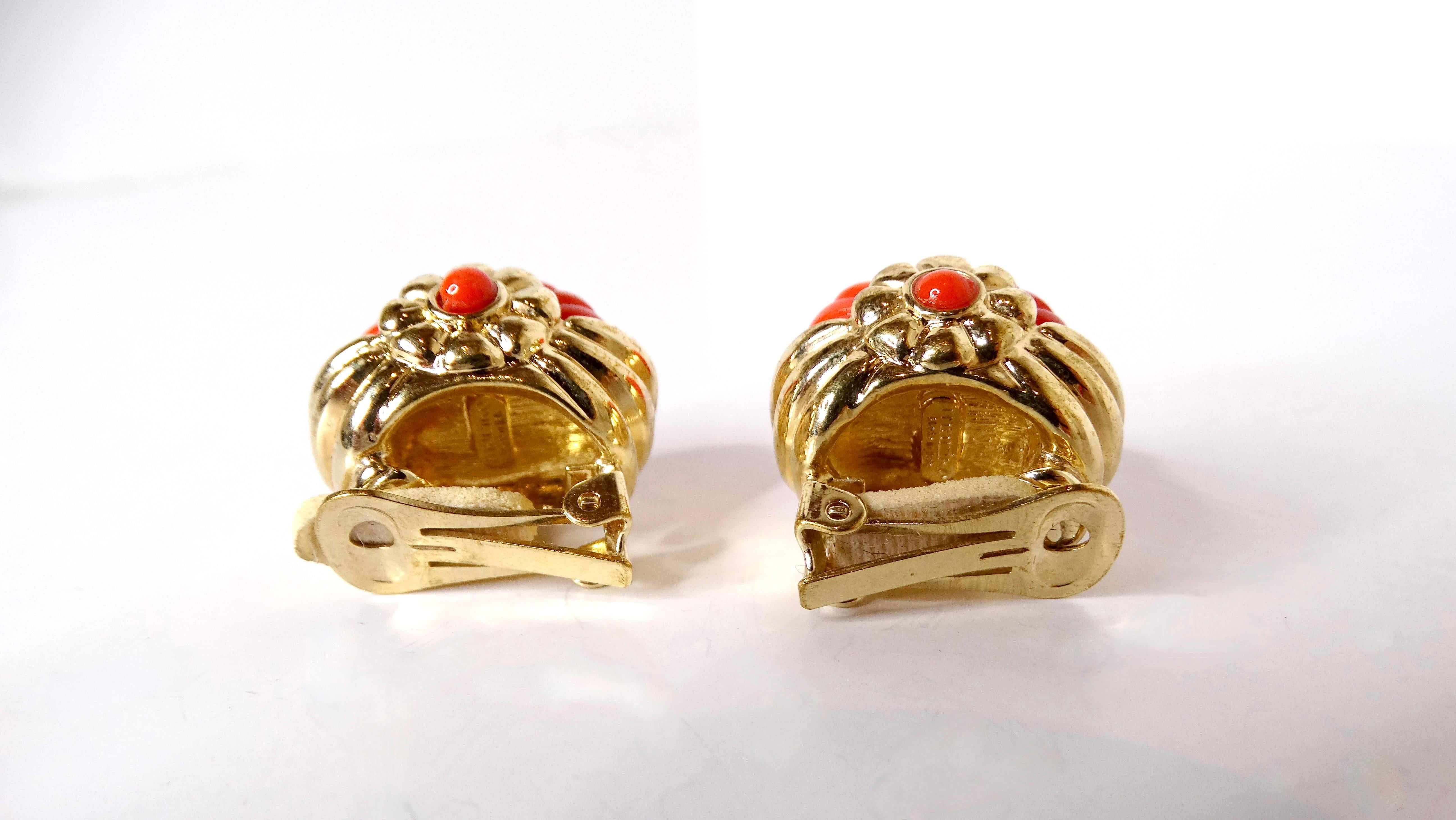 Introducing a stunning pair of 1960s Coral Acrylic & 14k Gold Plated Shell Motif Clip-On Earrings, exquisitely crafted in Italy. These vintage earrings showcase a captivating design that mirrors the graceful curves of a circular shell. The outer