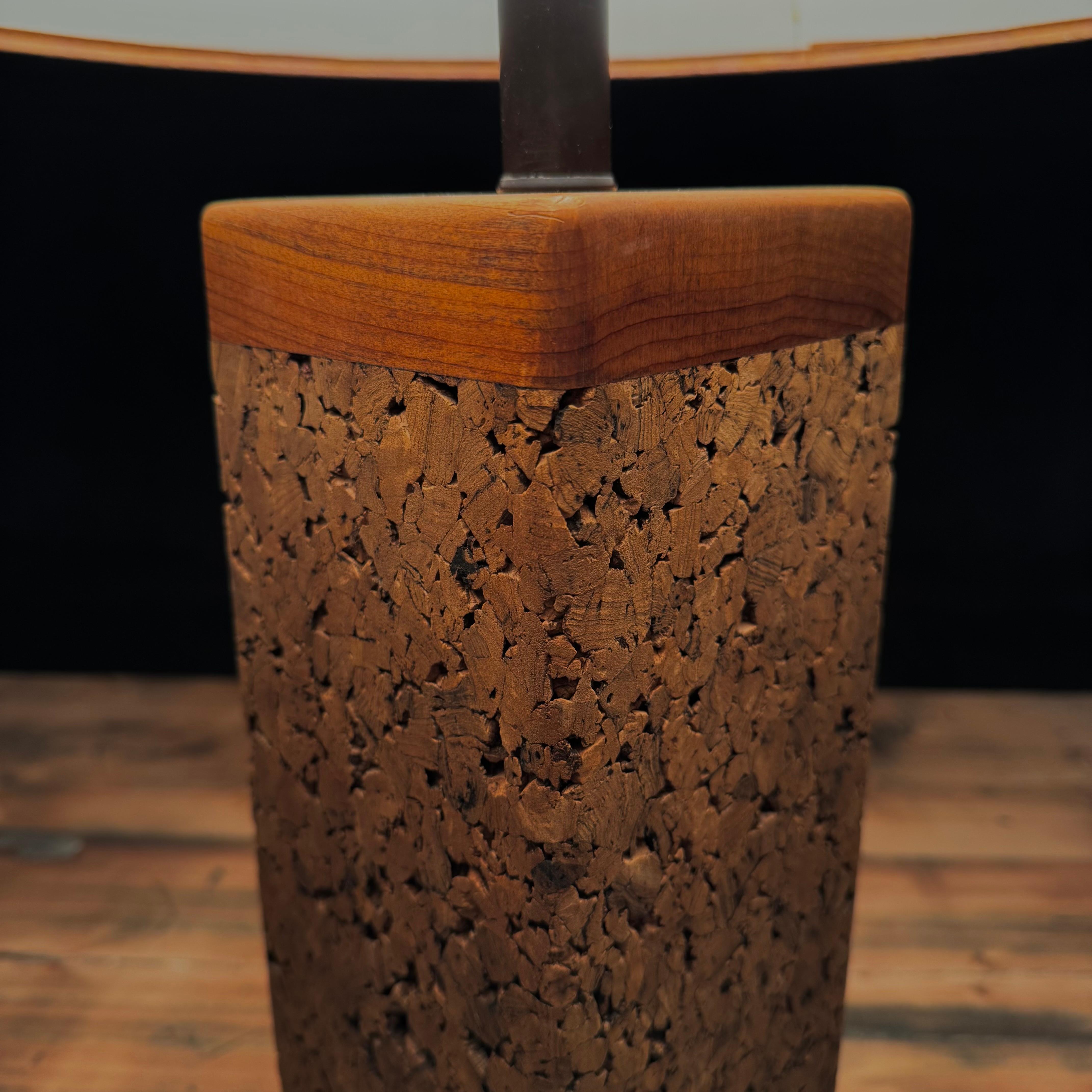 A nice pair of cork table lamps with pine details with original as found lamp shades.   Likely American made they are in excellent condition and were recently acquired from a collection in Seattle. 

Wired and fully functional.    Research pending