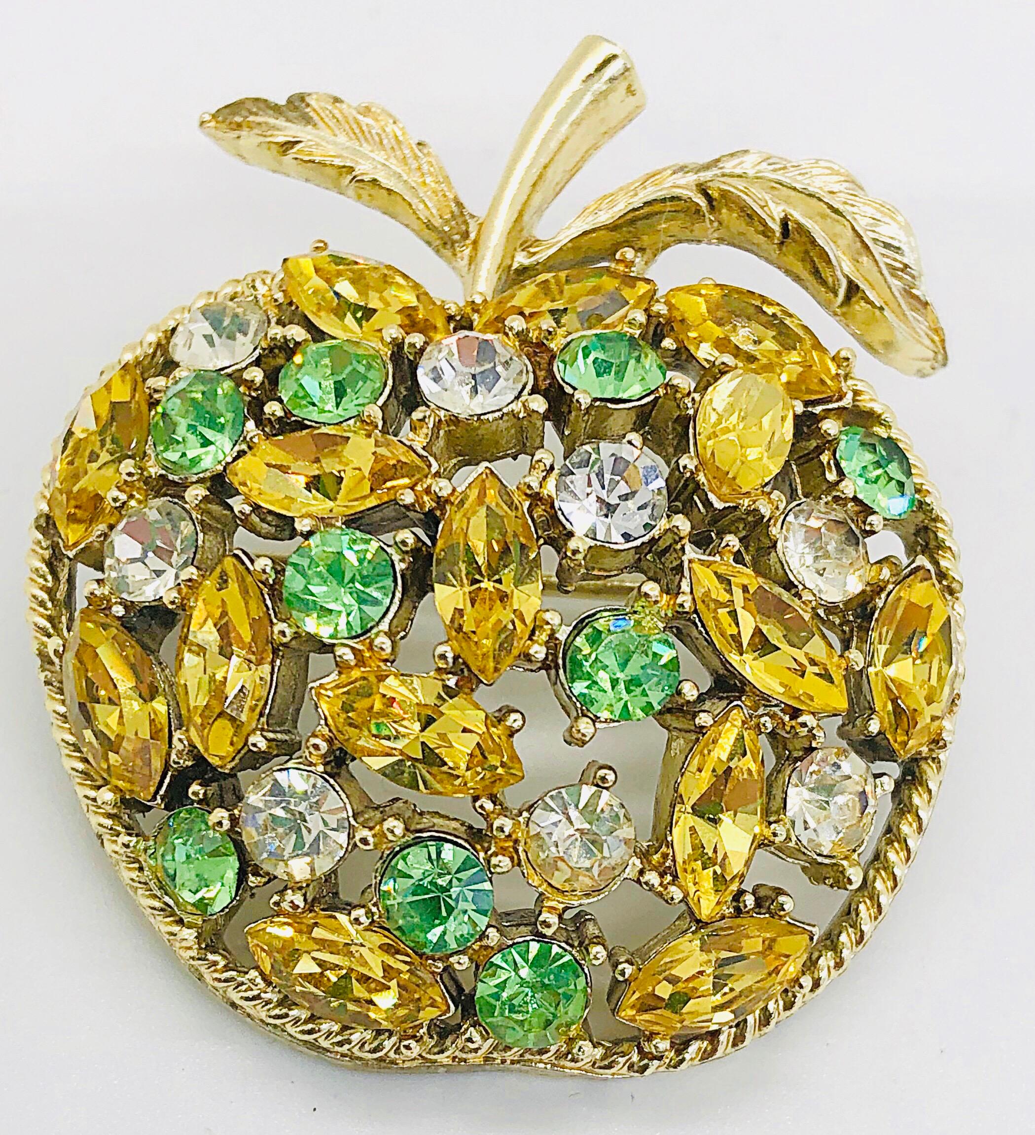 who voices the apple brooch