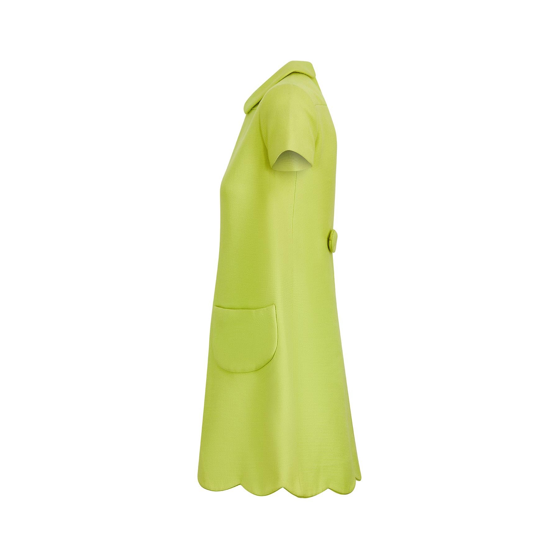Documented 1960s Courreges haute couture green mod dress.  Andre Courreges was already a fashion design superstar when this dress featured in Vogue in 1968 and the futuristic tailoring is synonymous with the designer who worked for Balenciaga during