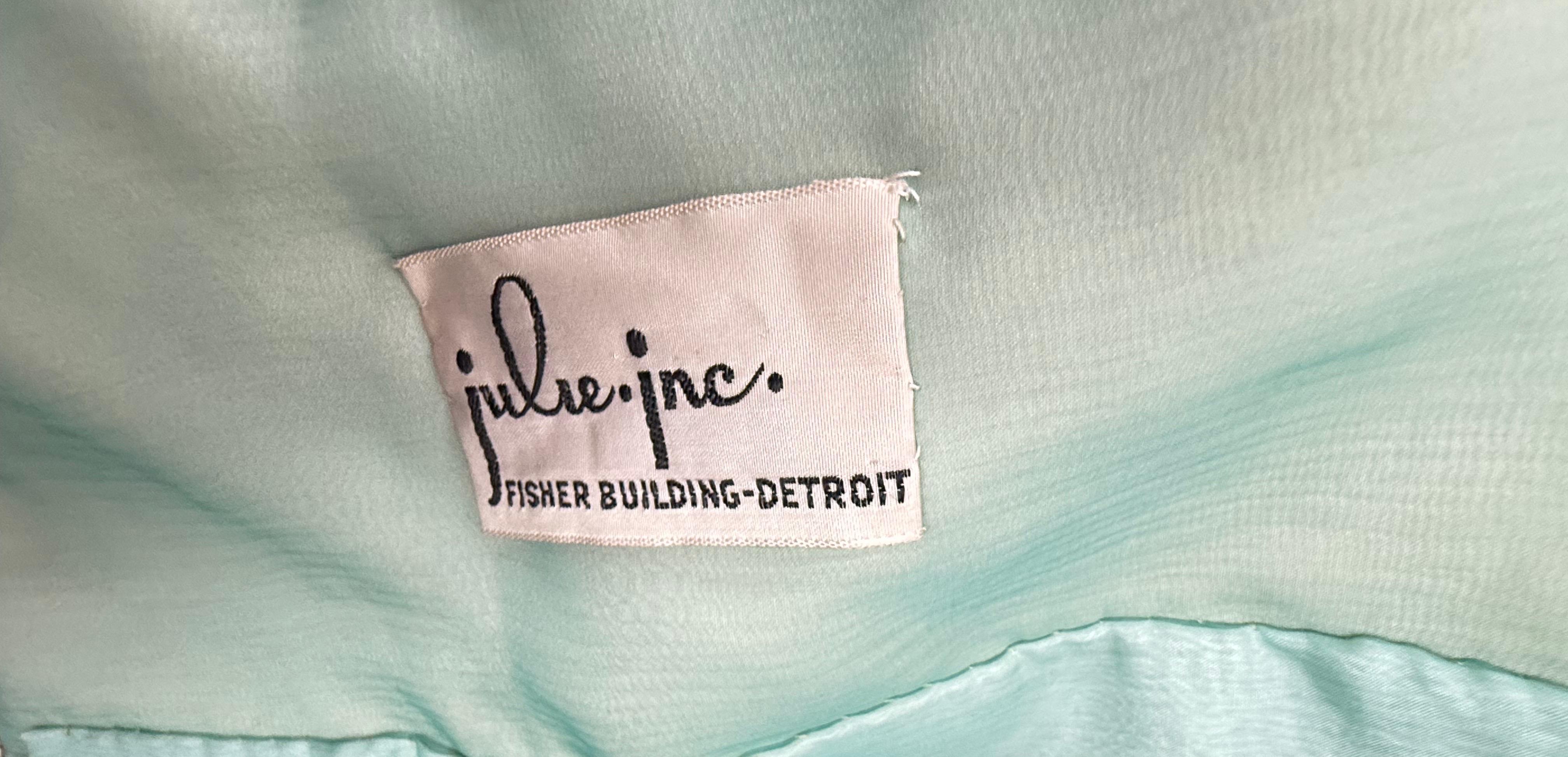 Stunning couture quality 1960s aqua colored beaded, rhinestone and sequin encrusted jacket ! Made for Julie, Inc. Detroit, which was the premiere shopping destination for luxury fashion.
 The jacket is the most beautiful aqua color. Thousands of
