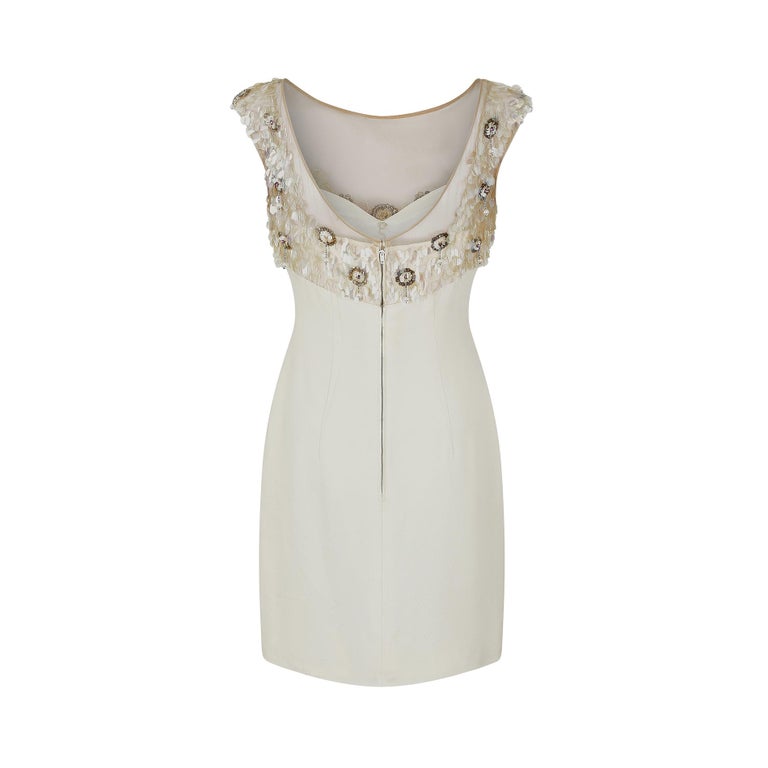 gold and black cocktail dress Strapless Drop Waist Belted Combo In Madonna’s 10-year-old twin daughters deep v-neckline Color:Full Ivory (pictured) This pretty cocktail dress