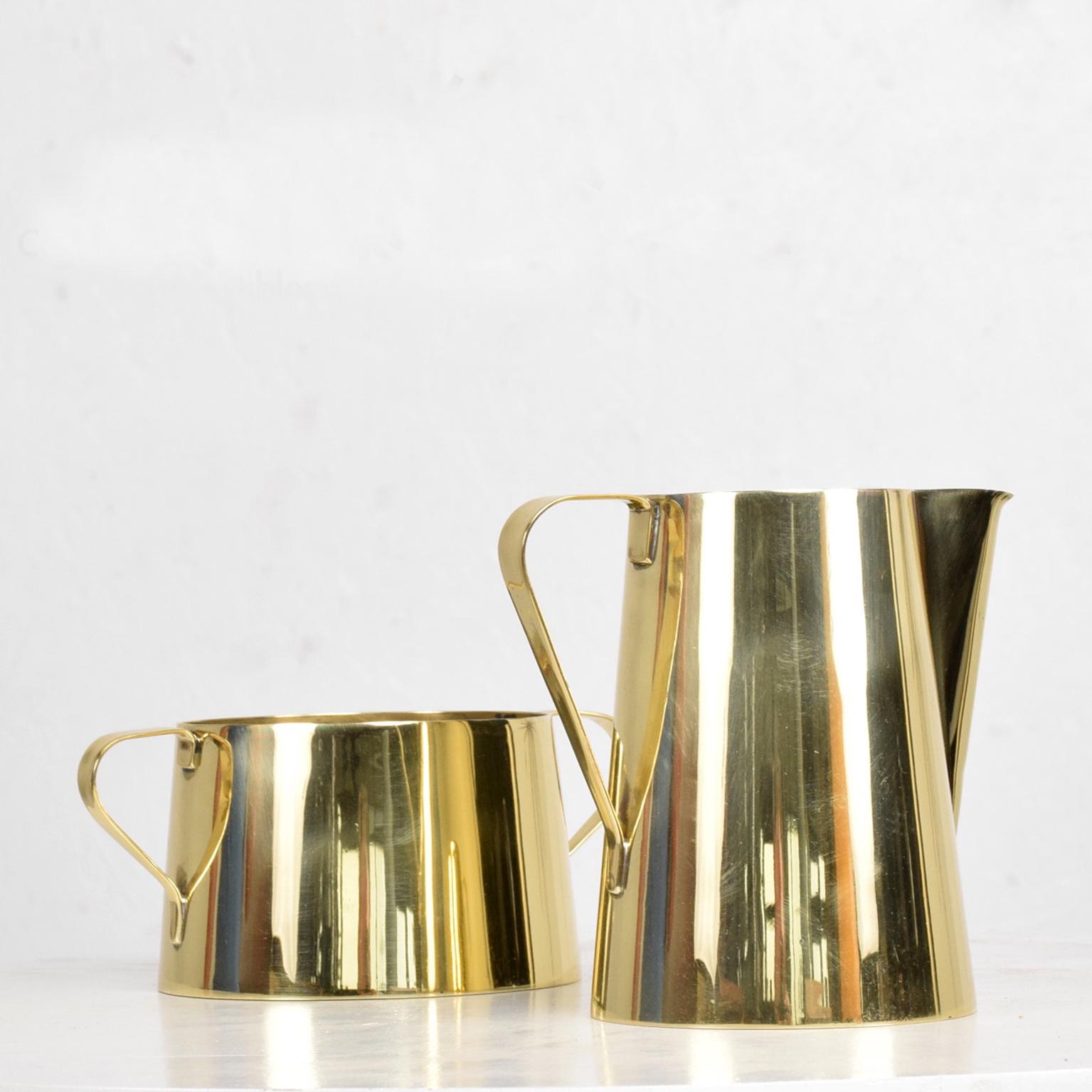 For your consideration a beautiful brass creamer and sugar bowl. 
By Tommi Parzinger for Dorlyn Brass,
circa 1960s.
Measures: 
Creamer: 5